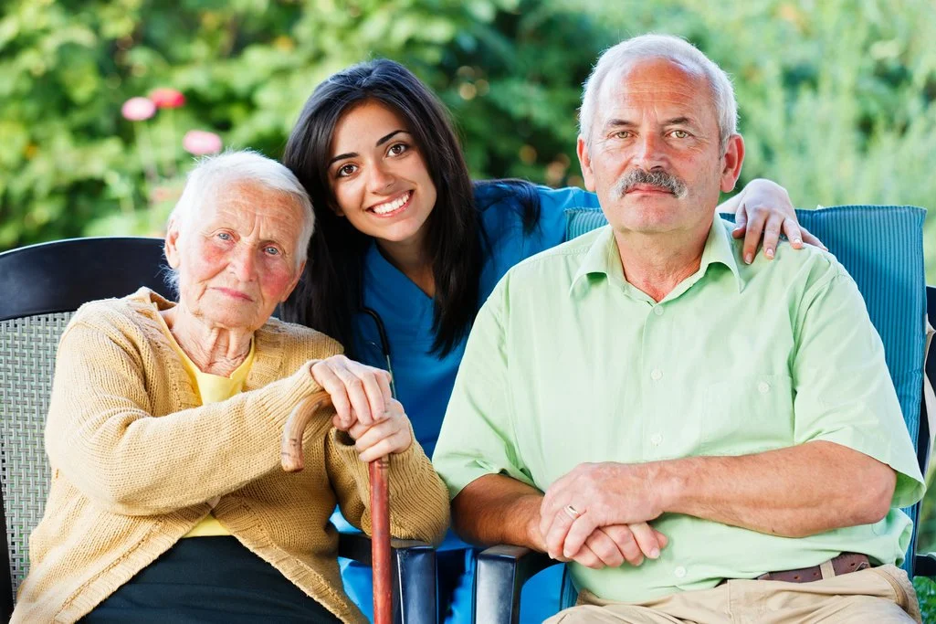 rsz_woman_helping_older_parents.jpg