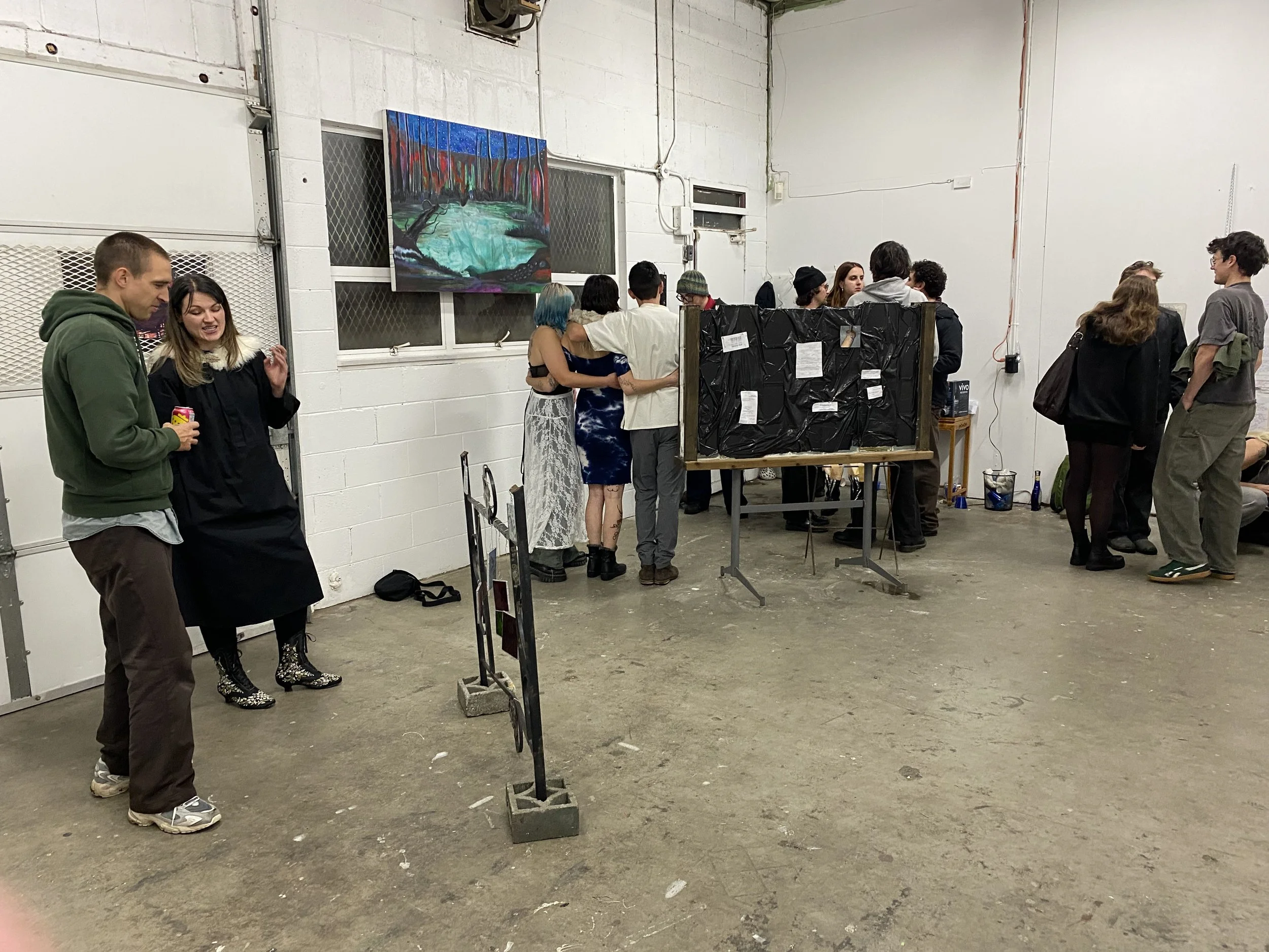 Painting and Sculpture on left by Shae Seqaqkind. Sculpture on right by Juliana Sech. 