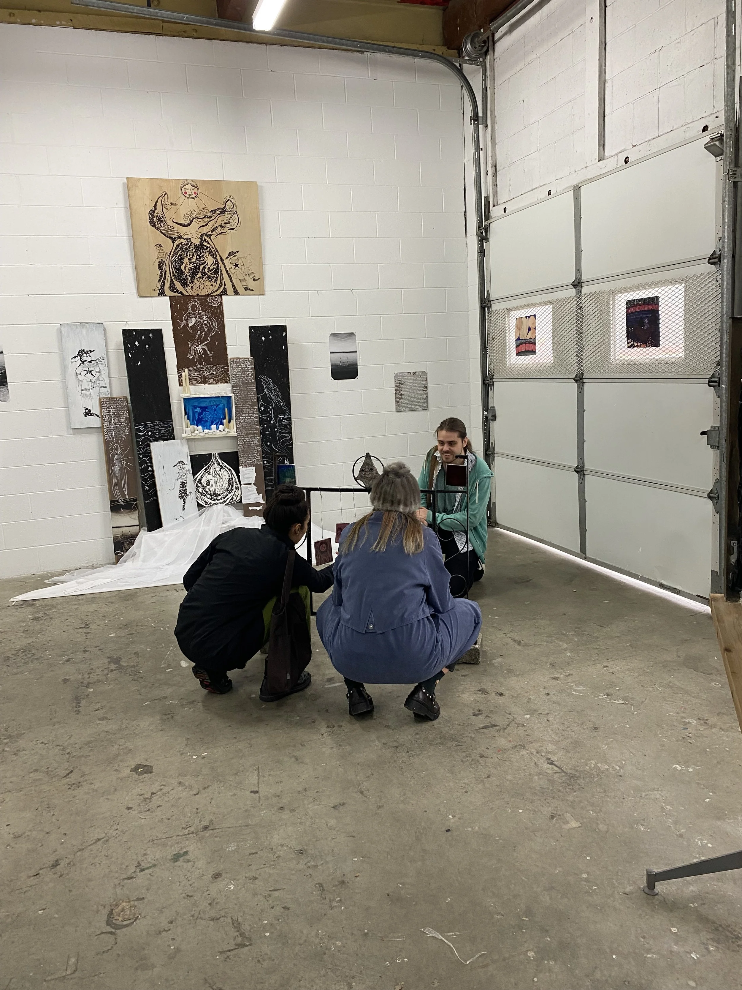 Sculpture on left by Meg Kockx. Sculpture at centre by Shae Seqaqkind. 