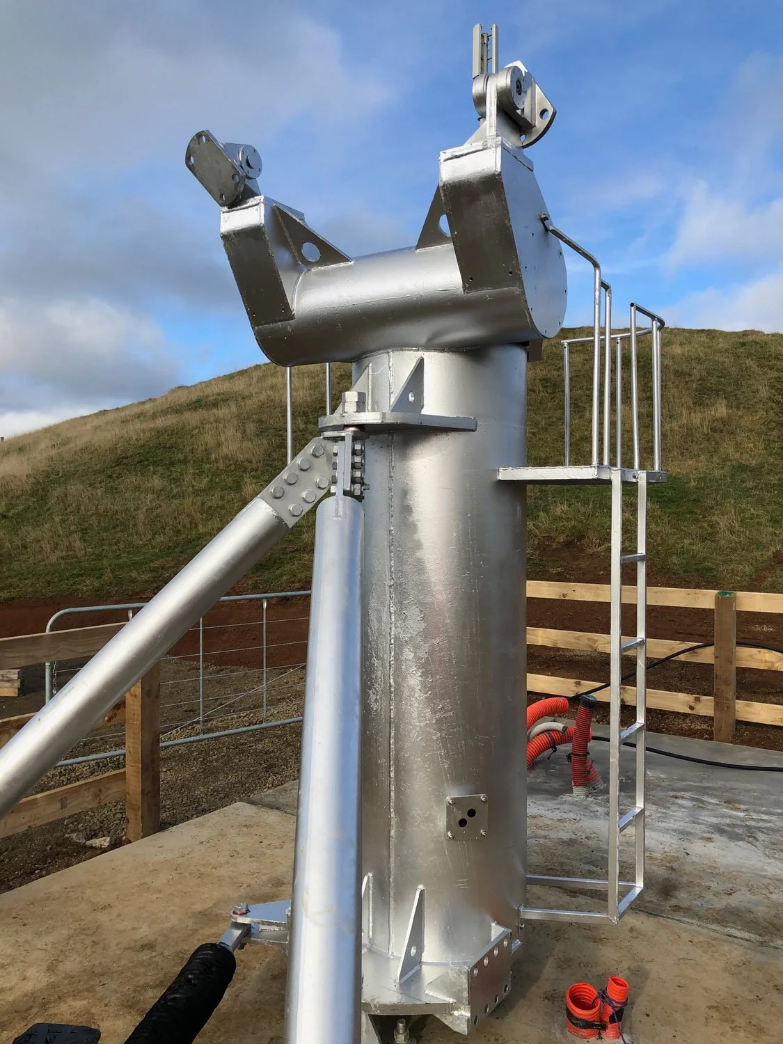 Satellite Earth Station antenna pedestal installed as part of ground station construction before antenna assembly.