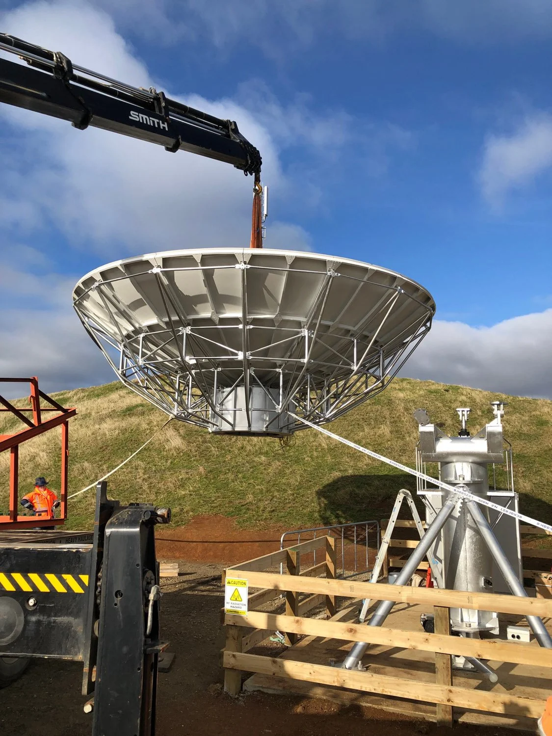 Installation of a satellite Earth Station antenna as part of Gateway Teleport's Earth Station construction services.