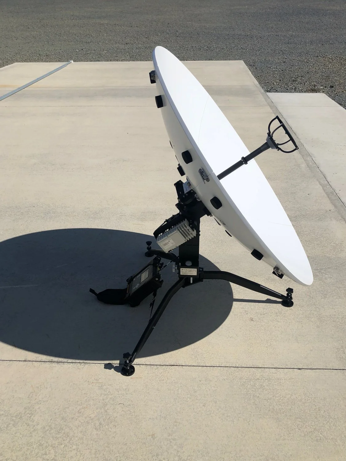 Portable flyaway satellite antenna used for emergency communications, disaster recovery and remote field operations.
