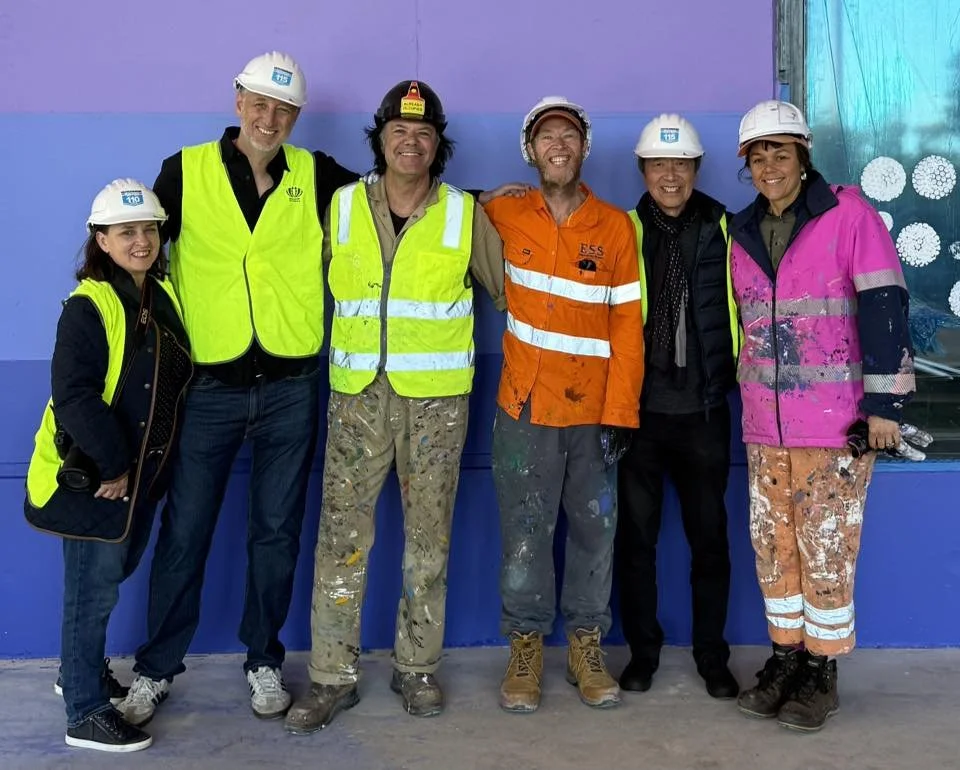 Art Atrium artist Blak Douglas at his new public art installation together with Jason Wing and Maddie Gibbs at the basketball court of the new Green Square Public School at Zetland.