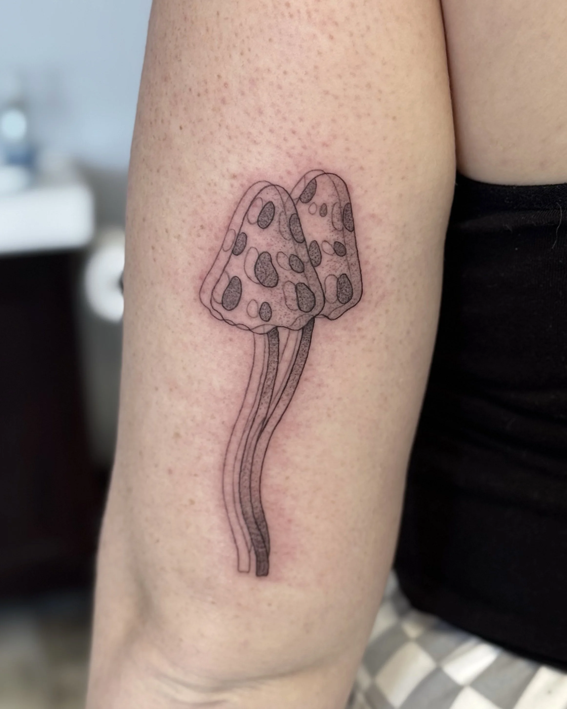 Illustrative mushroom tattoo