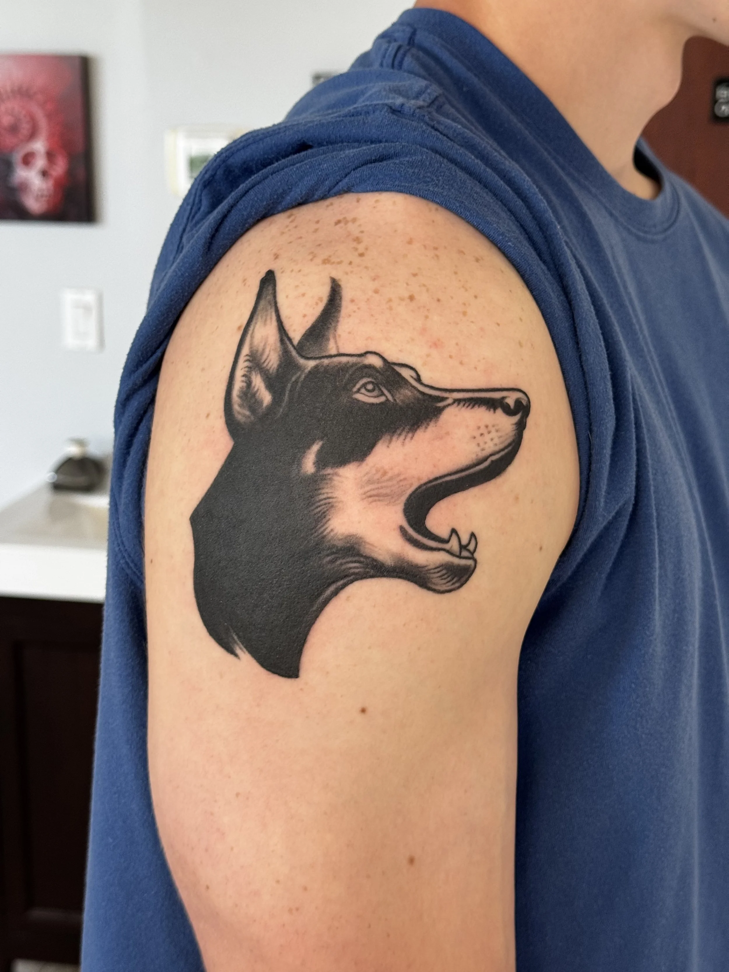 Illustrative dog tattoo