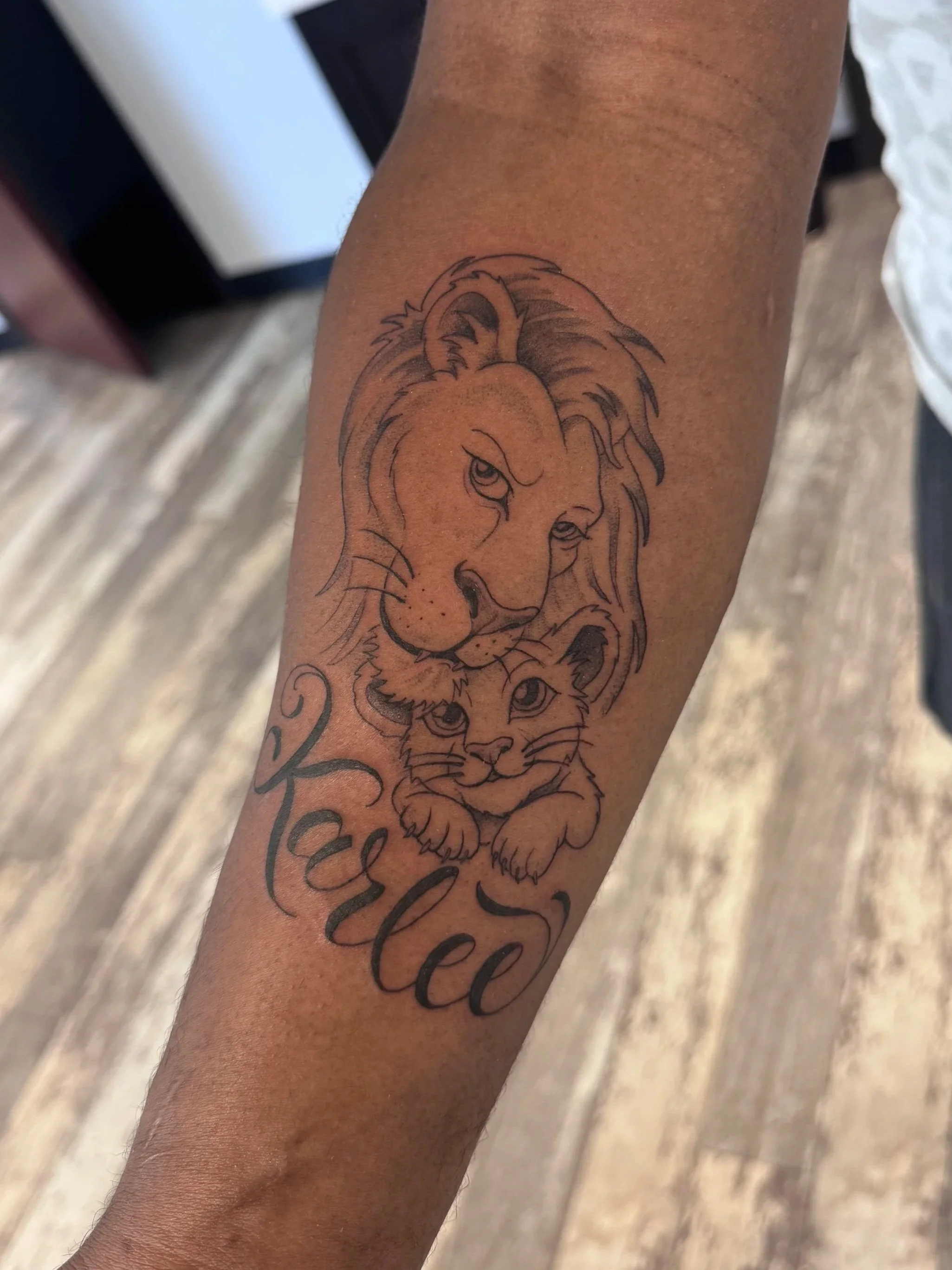 Illustrative lion tattoo