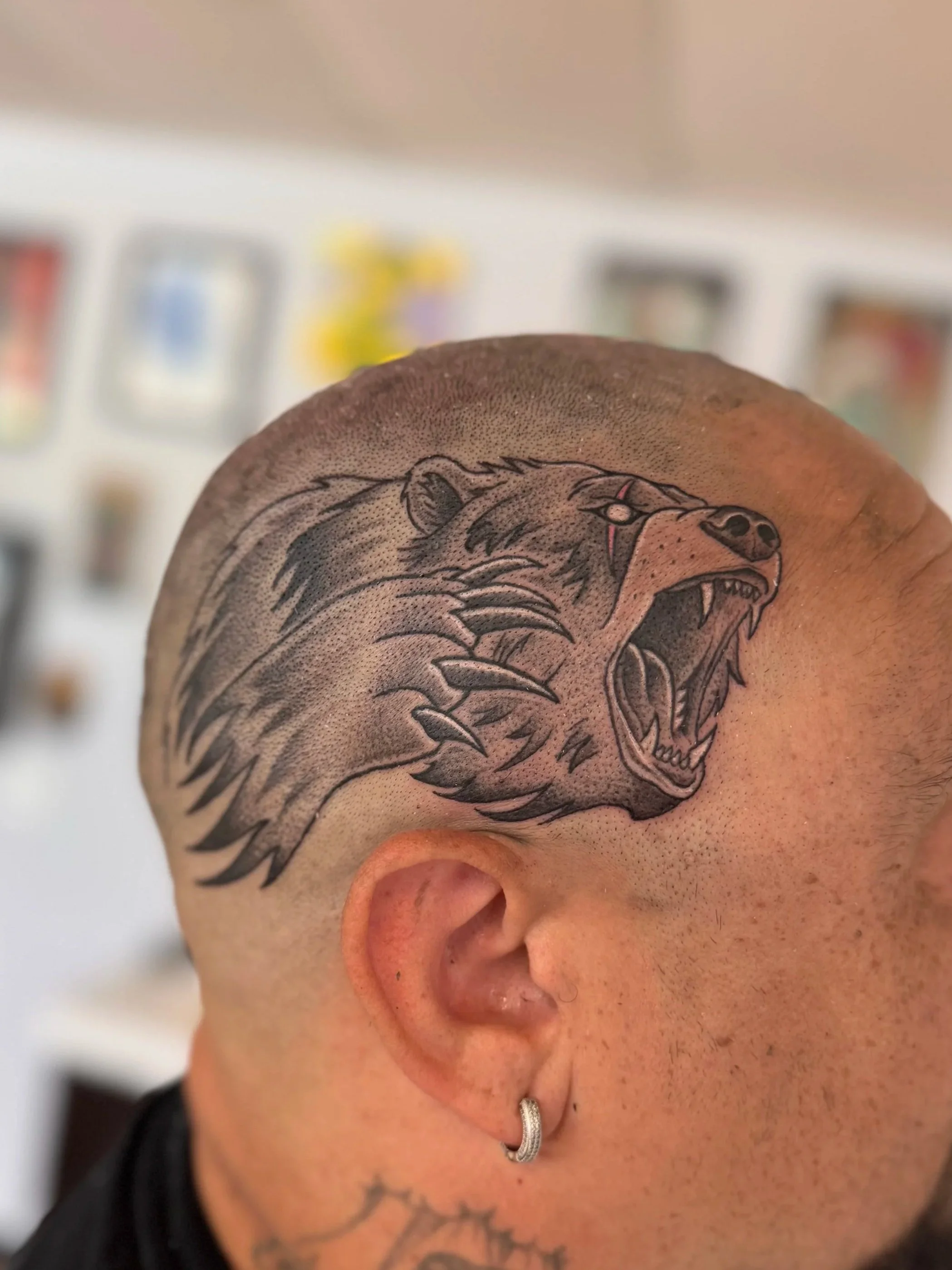 Illustrative bear tattoo
