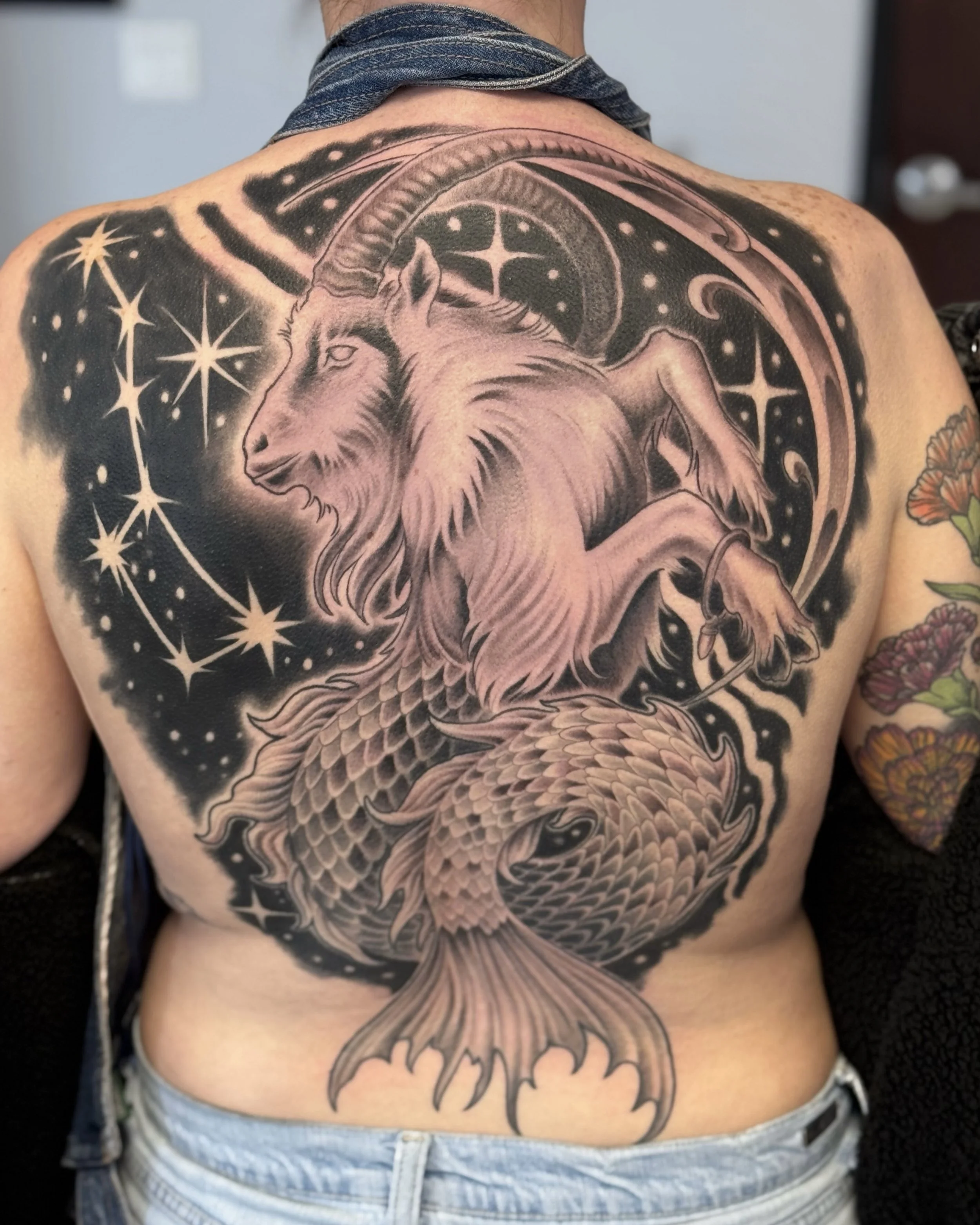 Illustrative capricorn tattoo
