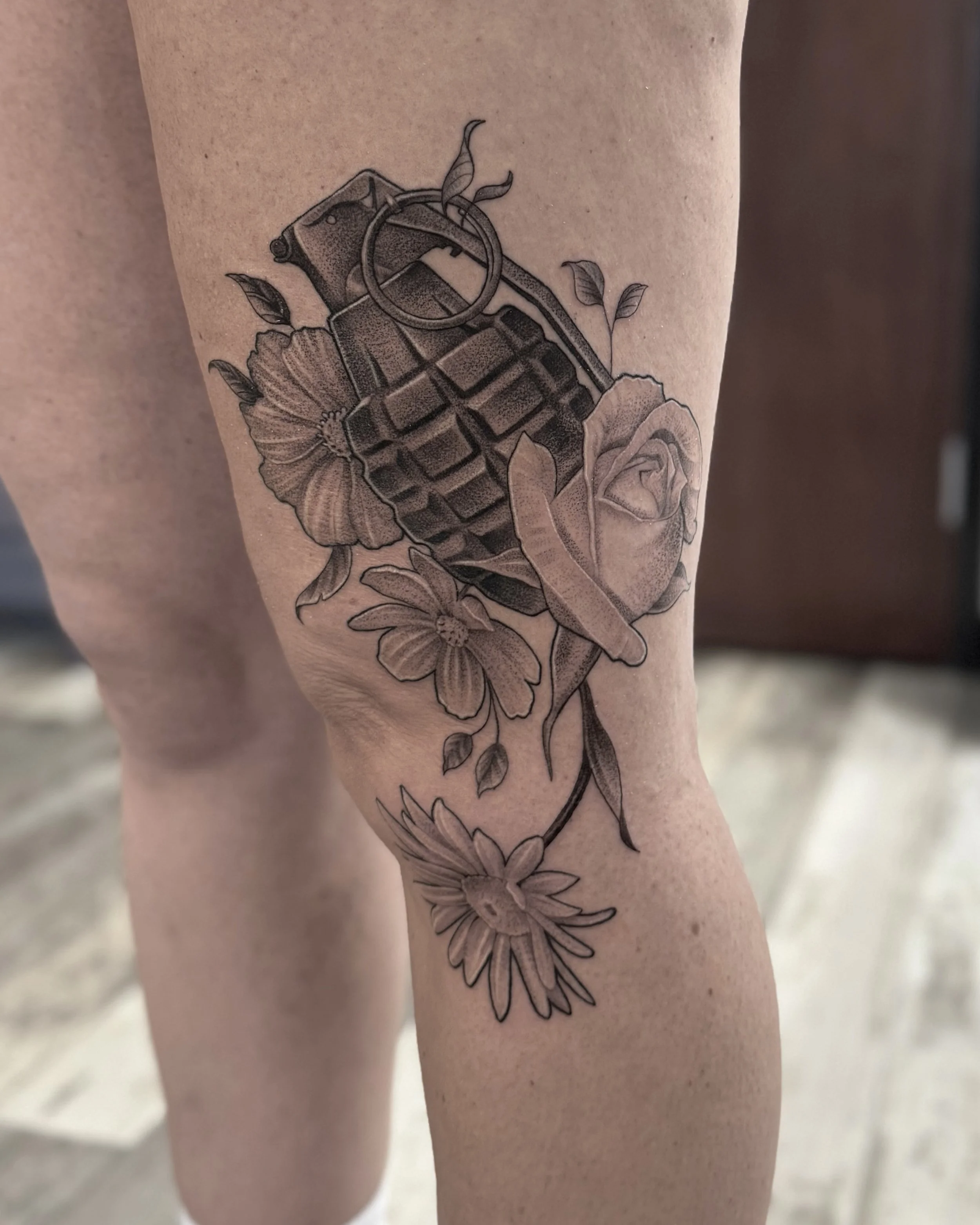 Illustrative grenade rose tattoo
