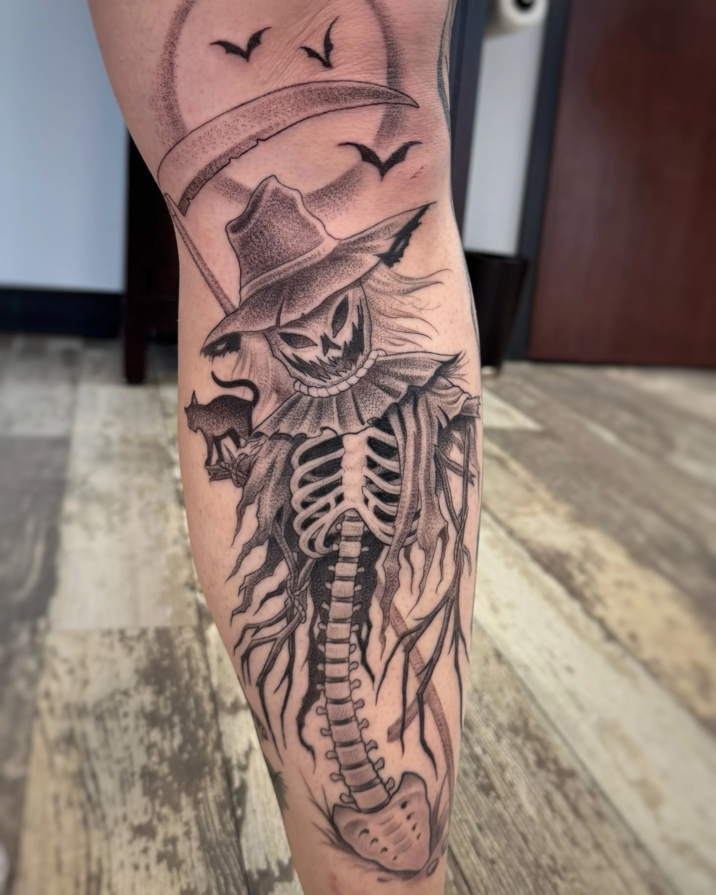 Illustrative scarecrow tattoo