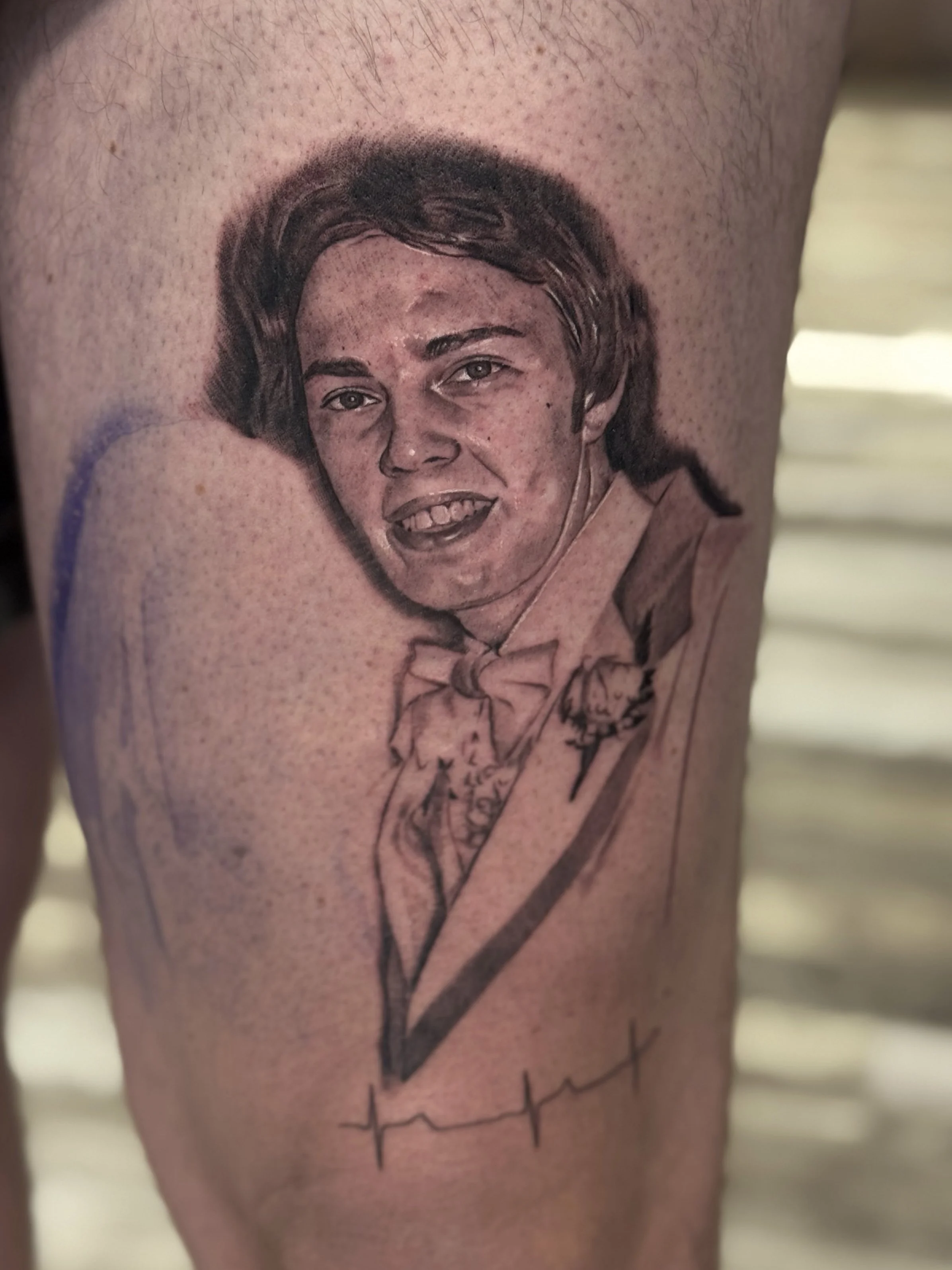 Black and gray portrait tattoo