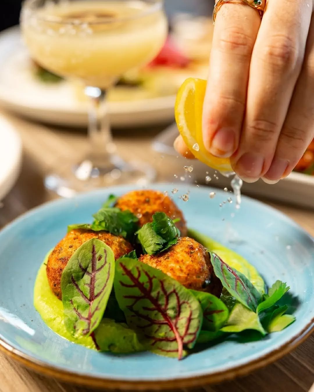 Our Salt Cod Fritters, served with parsley, dill, pea sauce, and a squeeze of lemon&mdash;a fresh starter to kick off your meal.

#therawson #therawsonbar #therocks