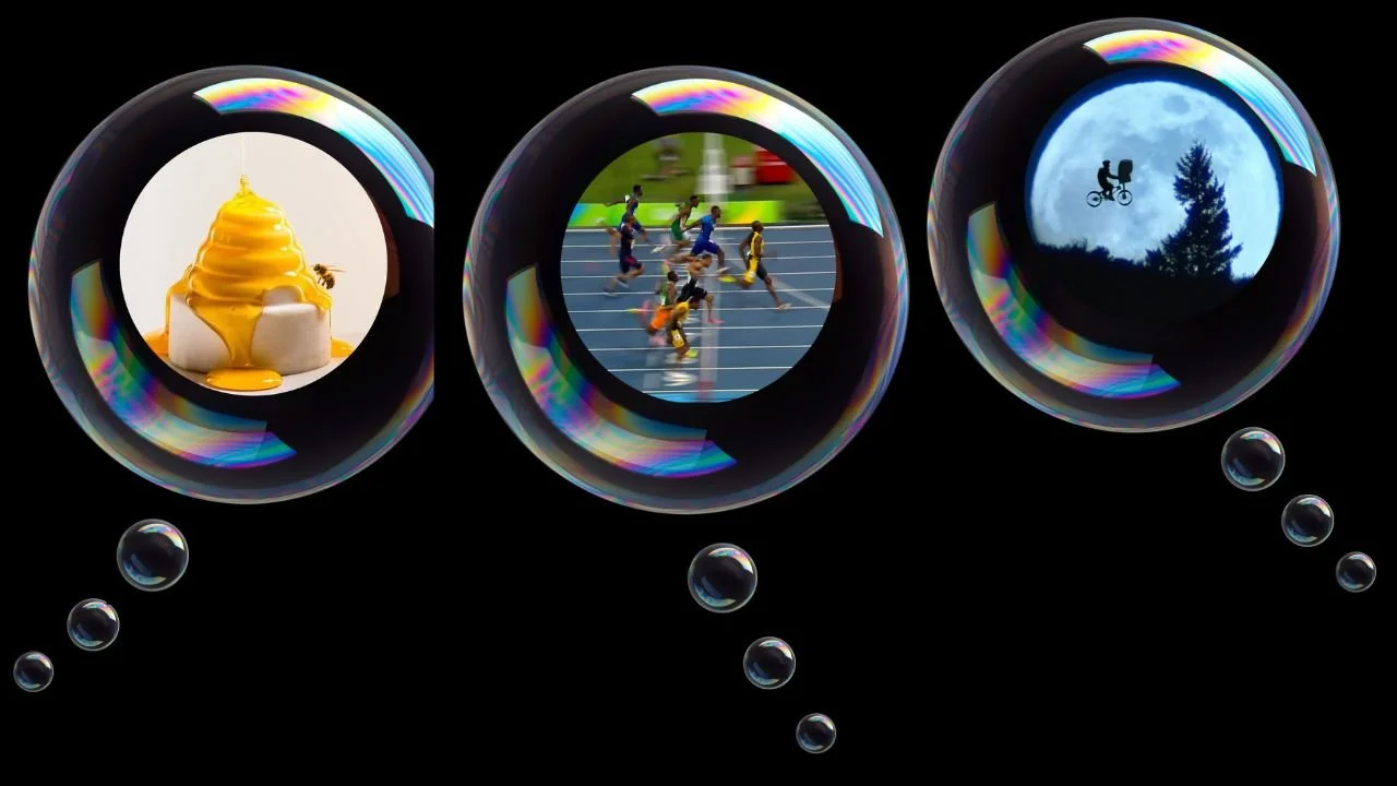Transparent bubbles representing what highly skilled people imagine. One with a desert in, one with the image of the 100 metre race and one with the scene from ET that John Williams composed the music for