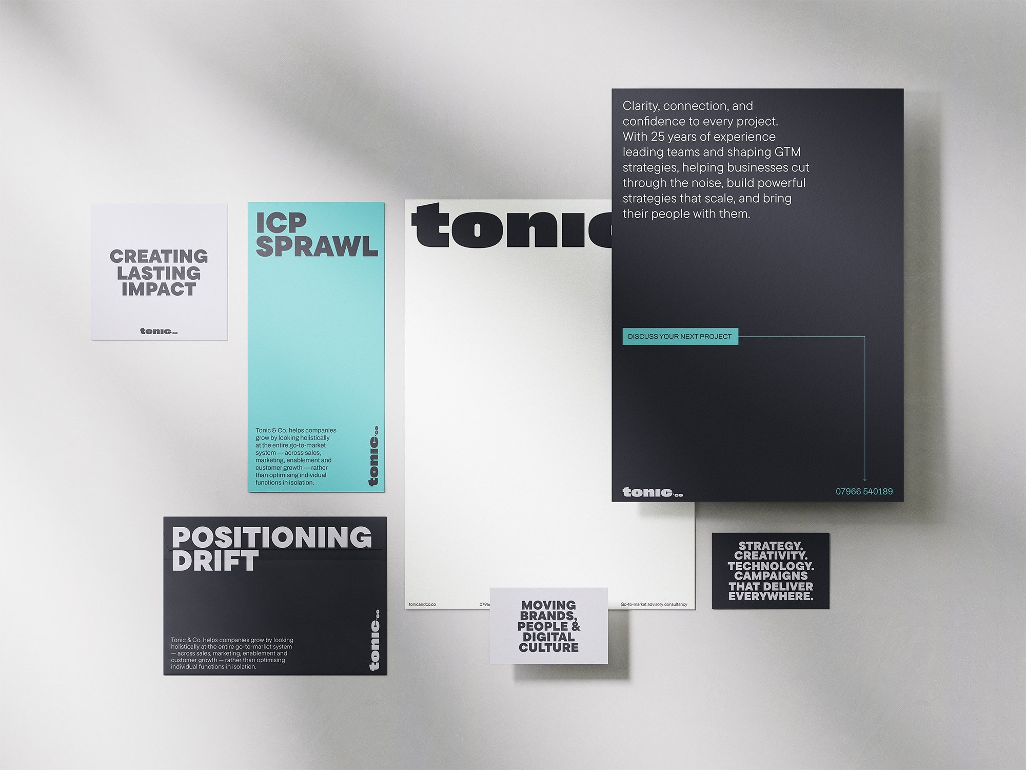 Collection of posters and cards with marketing and branding messages, including phrases like 'Creating Lasting Impact,' 'ICP Sprawl,' and 'Positioning Drift,' arranged on a light background.