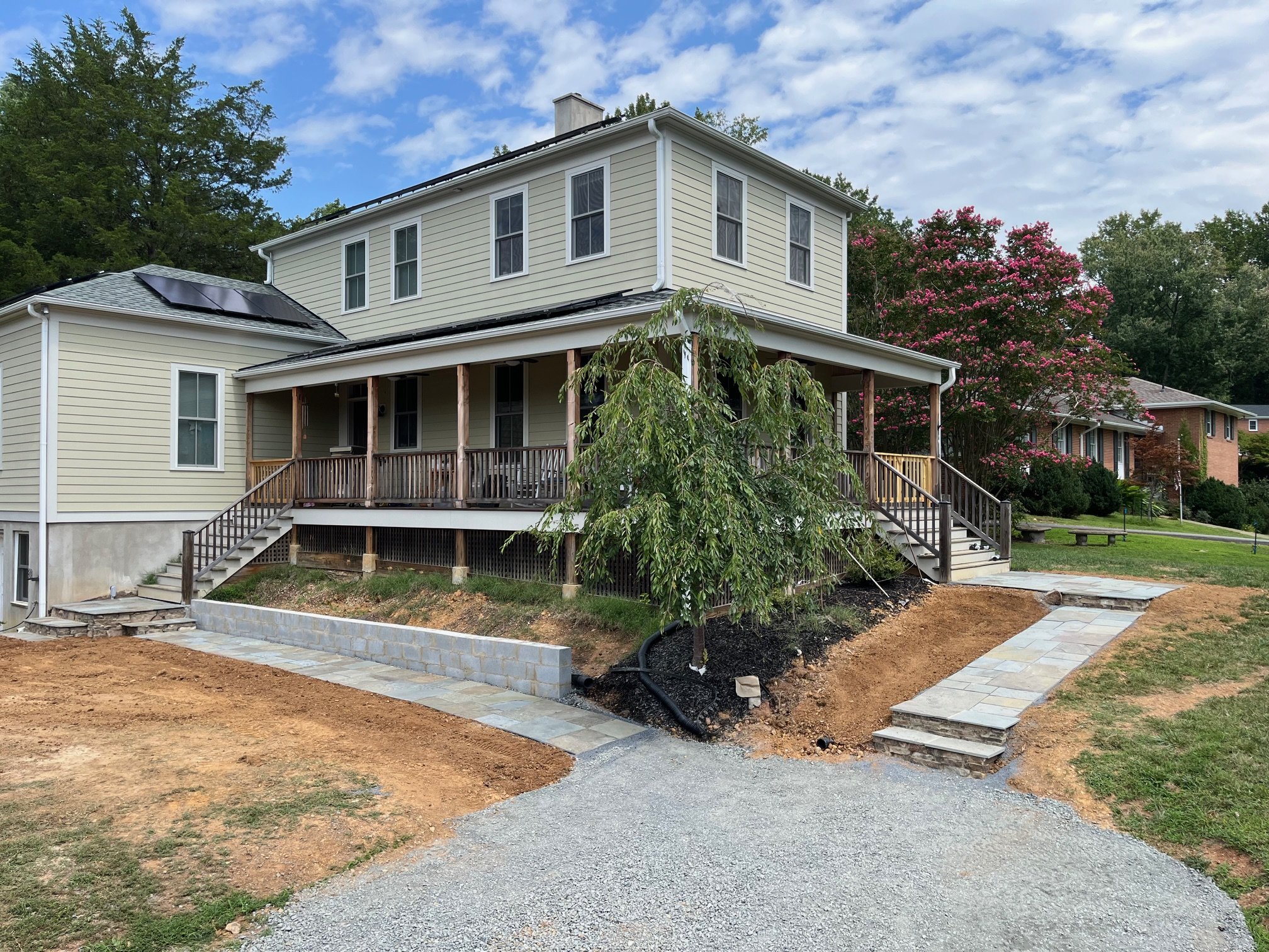 Bluestone walkway and retaining wall installation in Charlottesville - before image
