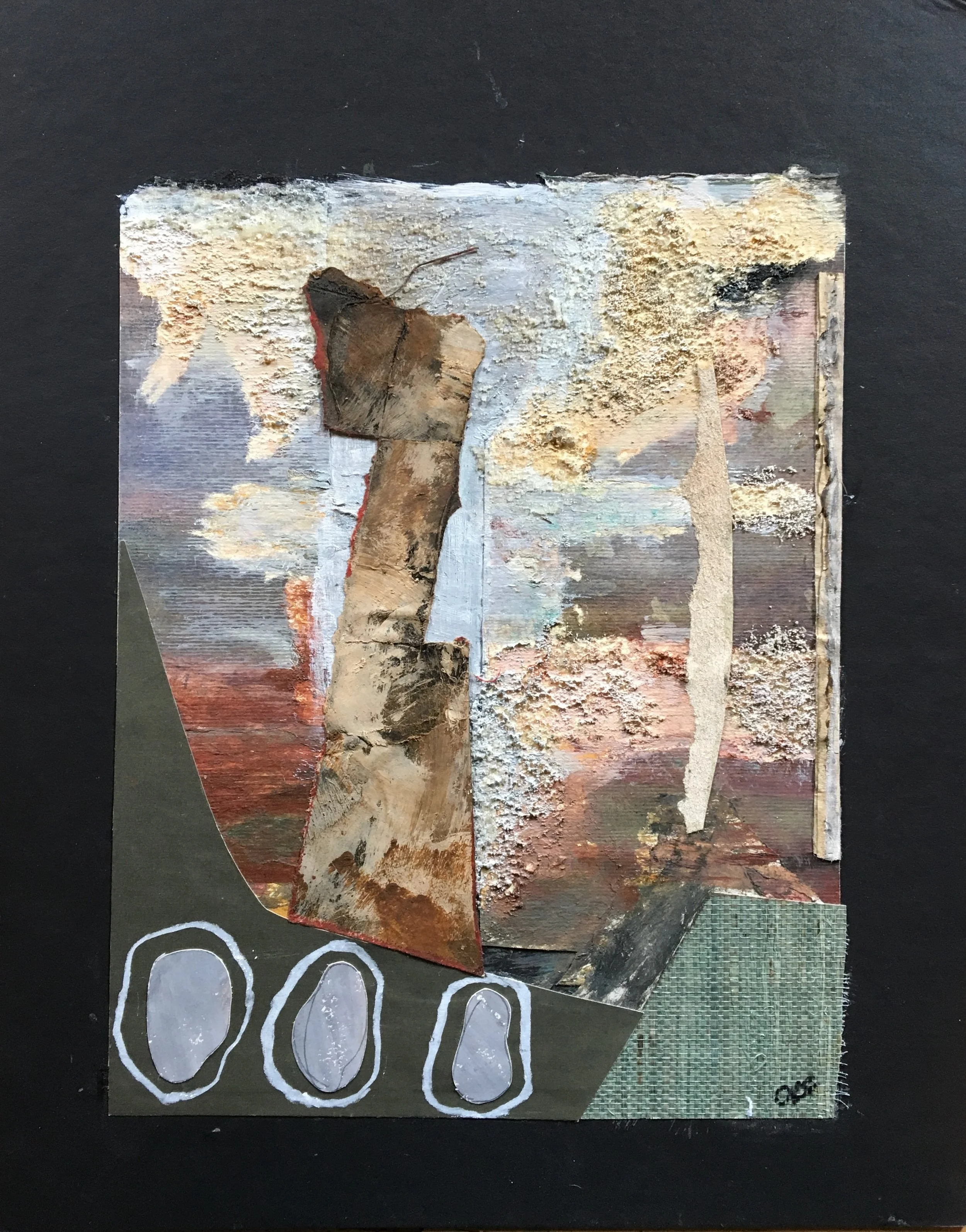 mixed media collage on black paper featuring a balancing act