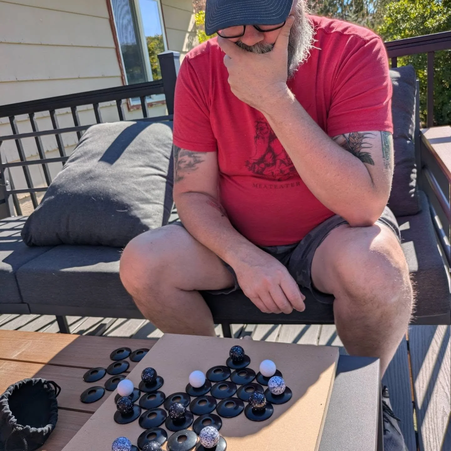 You'd think we get tired of games since we own The Tabletop Vault but we don't!  We love spending time together playing games, talking, and enjoying the sunshine.

  Today we are playing Zertz: a checkers like game we picked up at @originsgamefair . 
