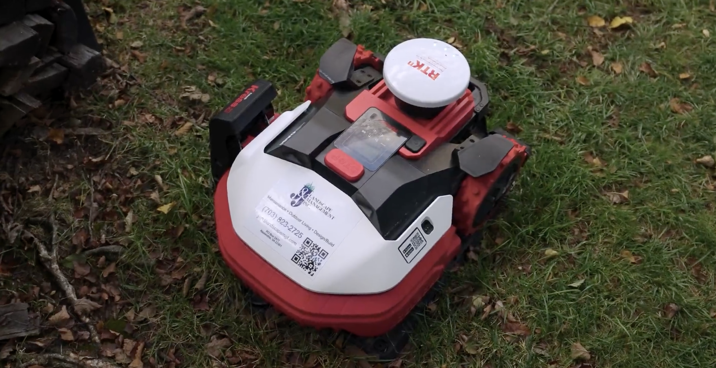 Quiet robotic mowing system operating safely around a residential lawn