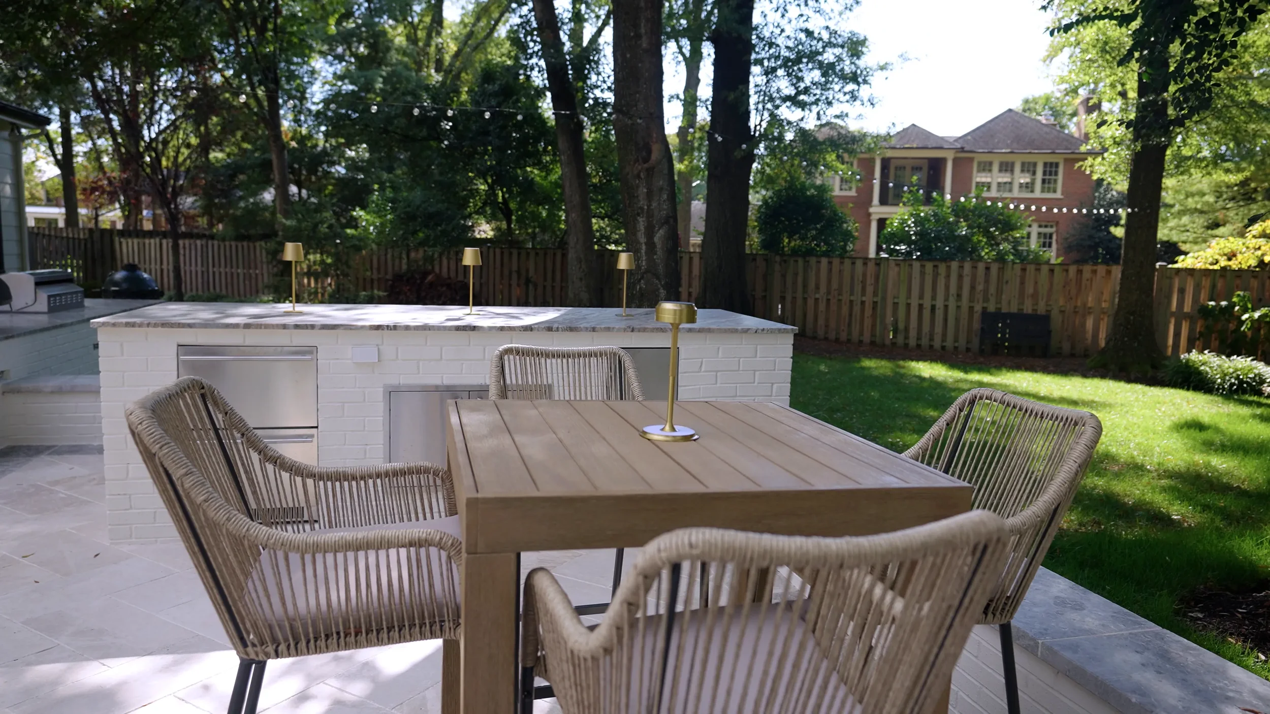 Outdoor kitchen integrated into a cohesive landscape design in Alexandria, VA