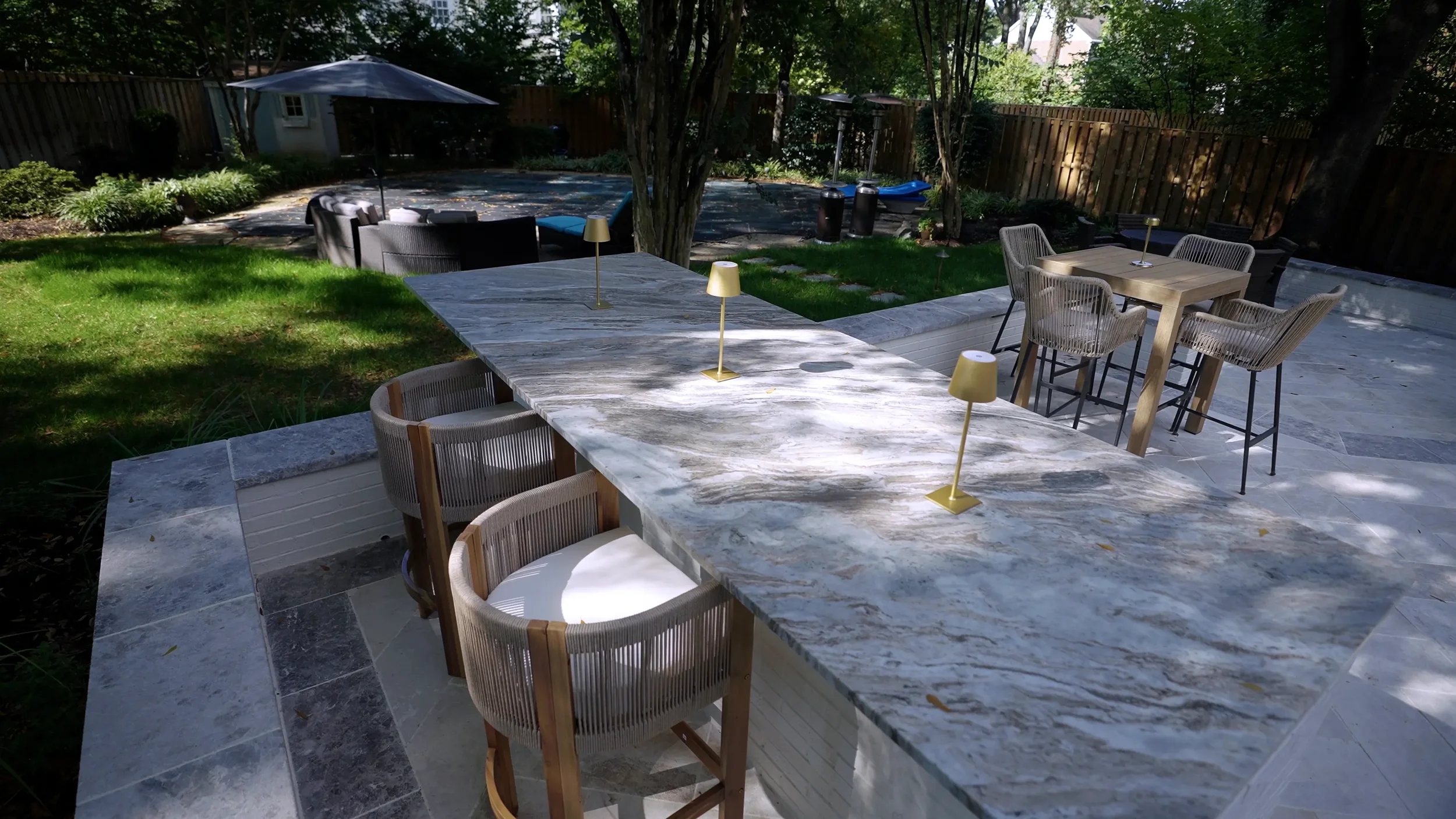 Backyard entertaining space completed by an experienced landscaping company in Alexandria, VA