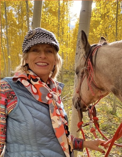 Living the life in Colorado and enjoying her Labs and her life with horses and the wilds of Colorado