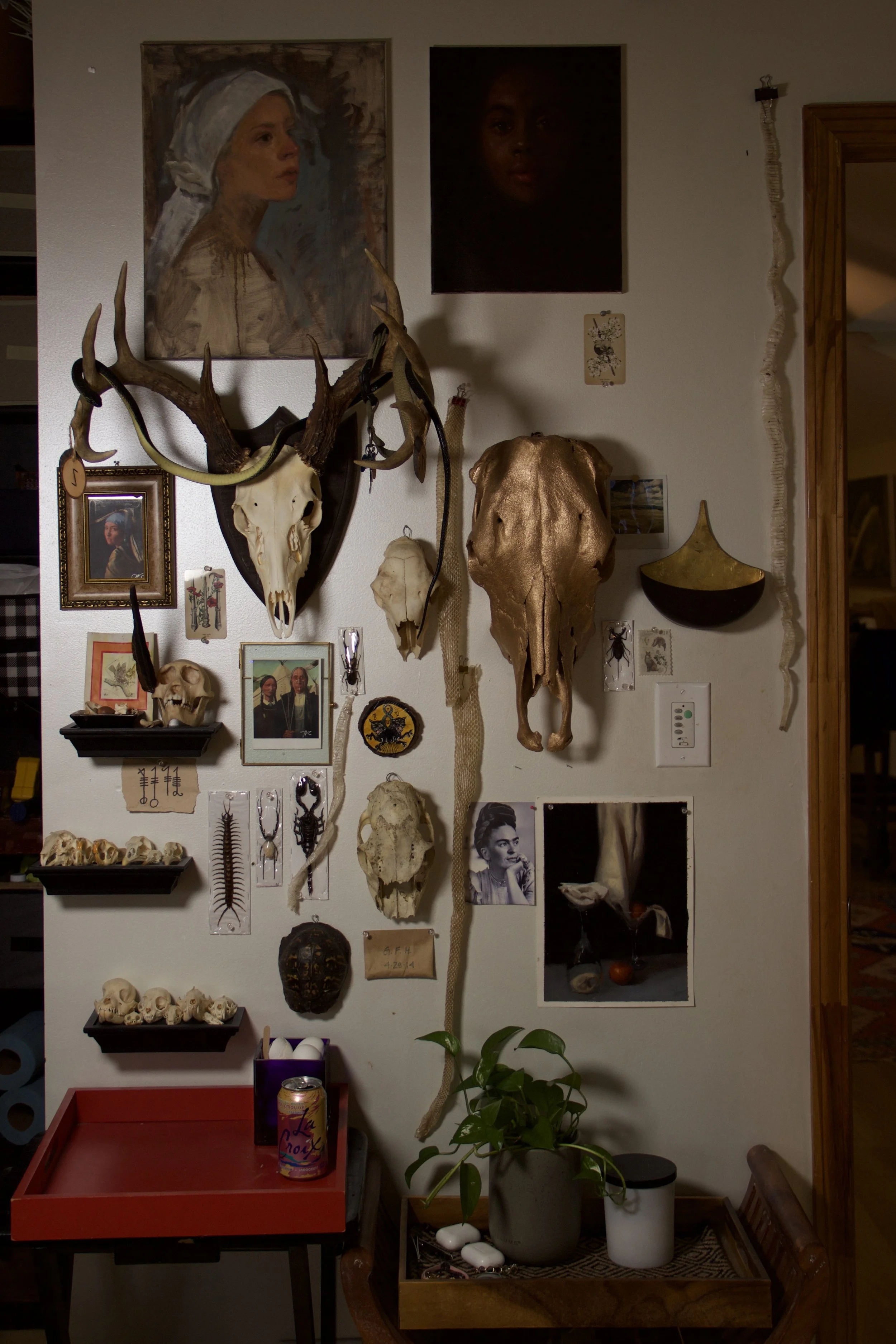 Photo inside Destiny's studio full of little things she collects, Skulls, artifacts, paintings, etc