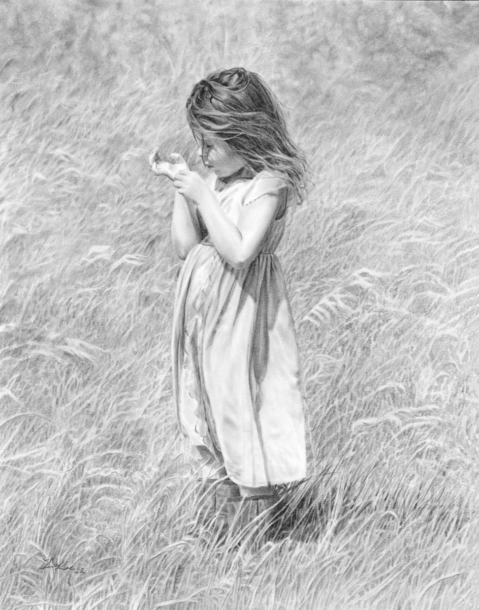 Graphite drawing of little girl in wheatfield looking at her hand.