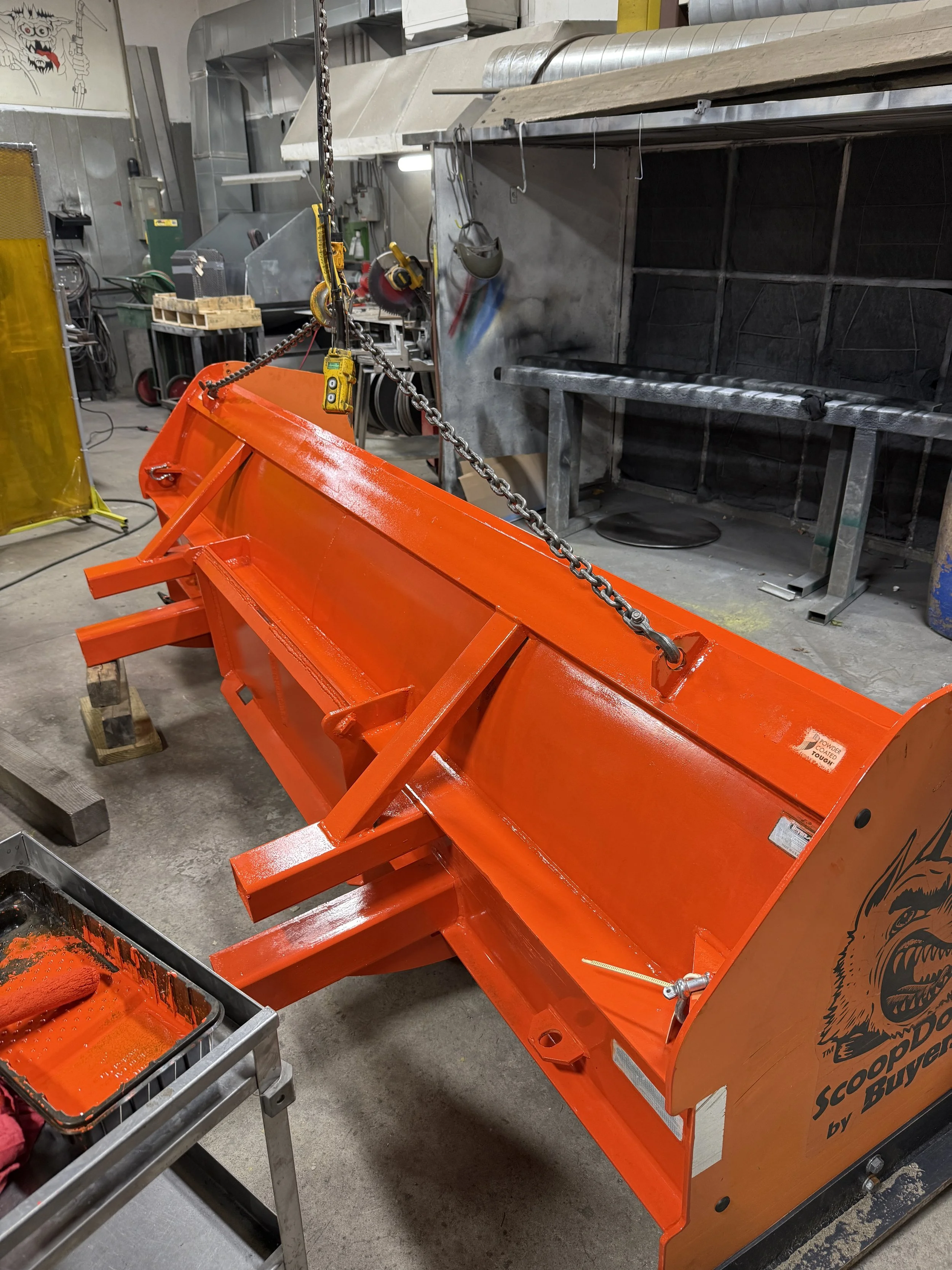 Custom fabricated snow pusher modifications