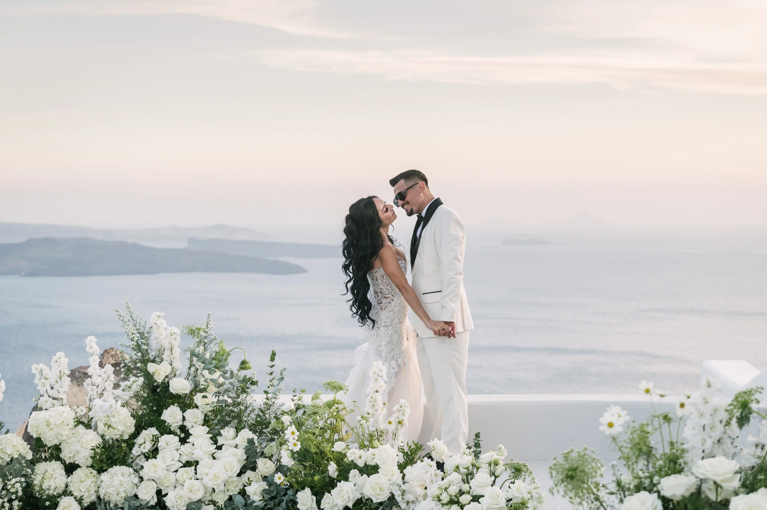 Luxury destination wedding ceremony overlooking the Aegean Sea in Greece