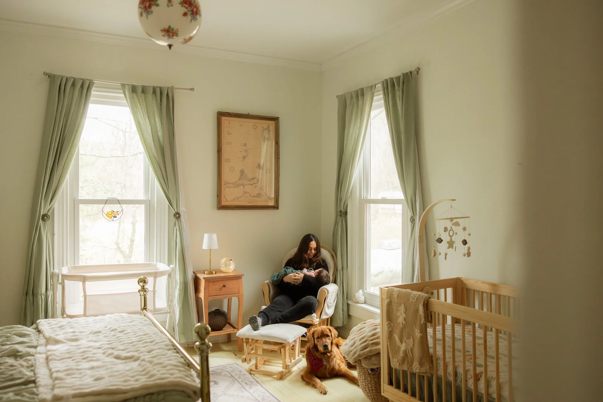 Family with dog and newborn baby, in-home lifestyle newborn photography Nashville TN.