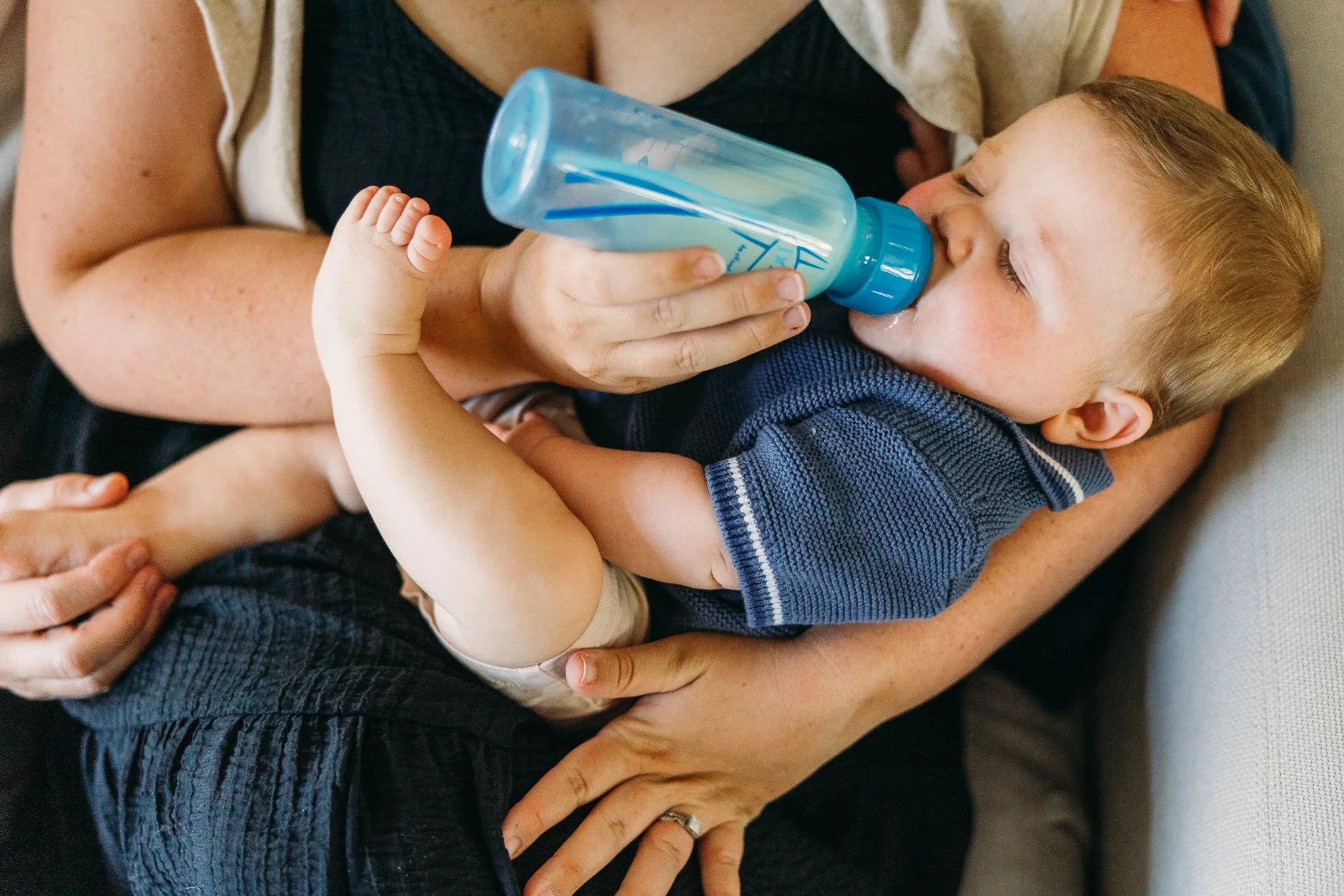 Baby having a bottle for baby photos