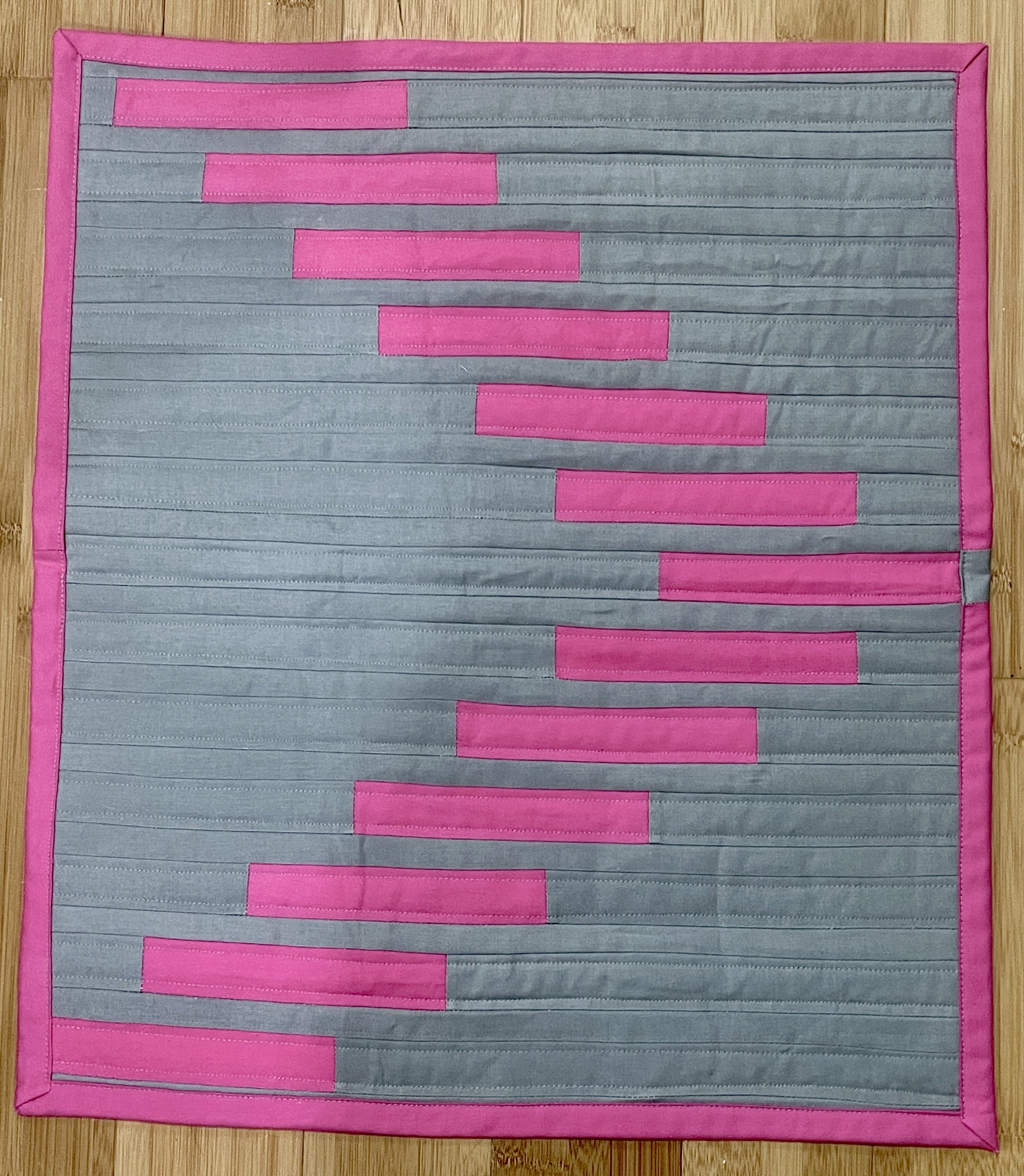 A mini quilt I made trying out a new pattern.