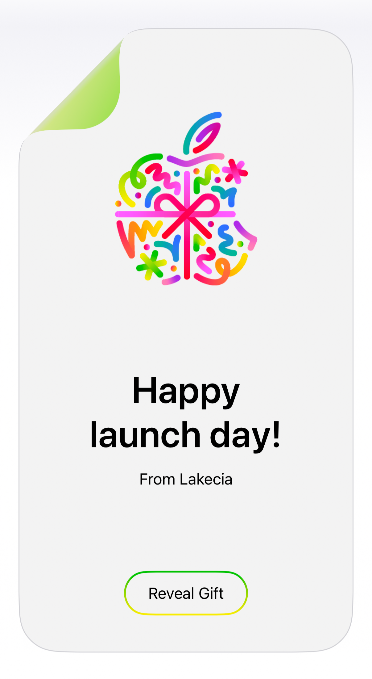 A digital greeting card with a colorful, abstract Apple logo at the top, text that reads "Happy launch day! From Lakecia," and a button labeled "Reveal Gift."