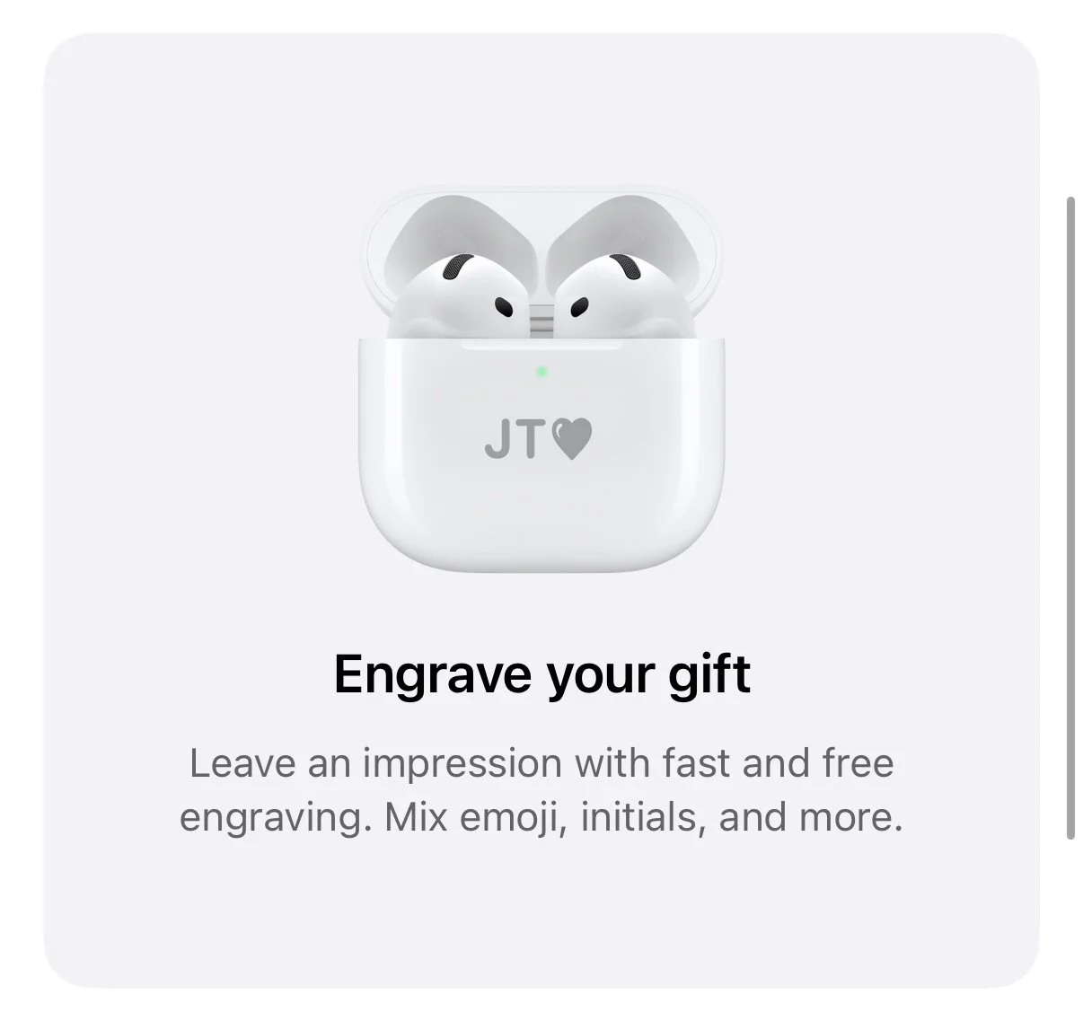 Wireless earbuds in a charging case with a personalized engraving 'JT♥' on the case, on a promotional mockup for engraving gifts.