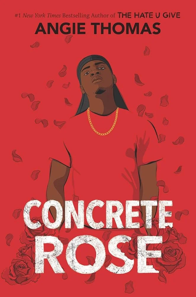 Book cover of 'Concrete Rose' by Angie Thomas. The cover is red with an illustration of a young man wearing a black cap, gold chain, and red shirt. Red rose petals and roses are illustrated at the bottom. The title 'Concrete Rose' is in large white l