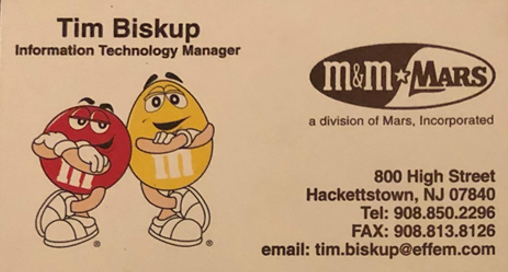 Business card for Tim Biskup, Information Technology Manager at M&M Mars division of Mars, Incorporated, with illustrations of red and yellow M&M characters.