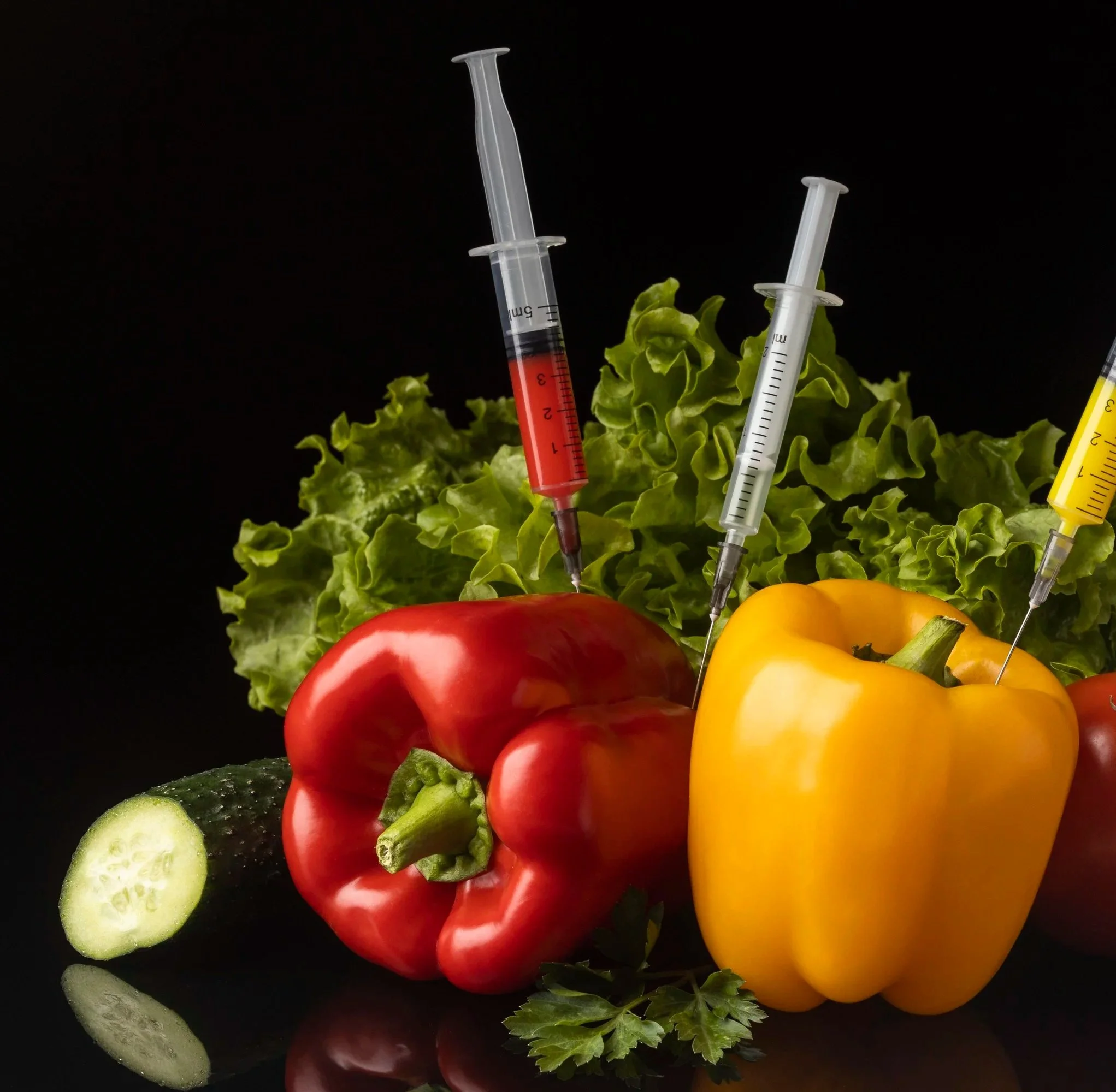 Acupuncture treatment with acupuncture needles inserted into a patient's back while a practitioner holds an herbal medicine stick.