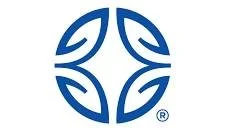 A blue logo consisting of four stylized leaf or petal shapes arranged in a circular pattern.