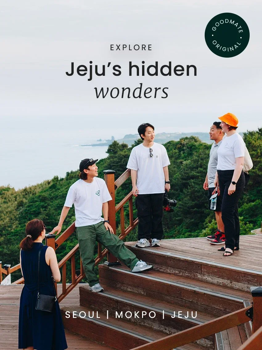 A group of people standing on wooden stairs overlooking a scenic view with trees and ocean. Text reads: "Explore Jeju's hidden wonders" and lists locations: Seoul, Mokpo, Jeju.
