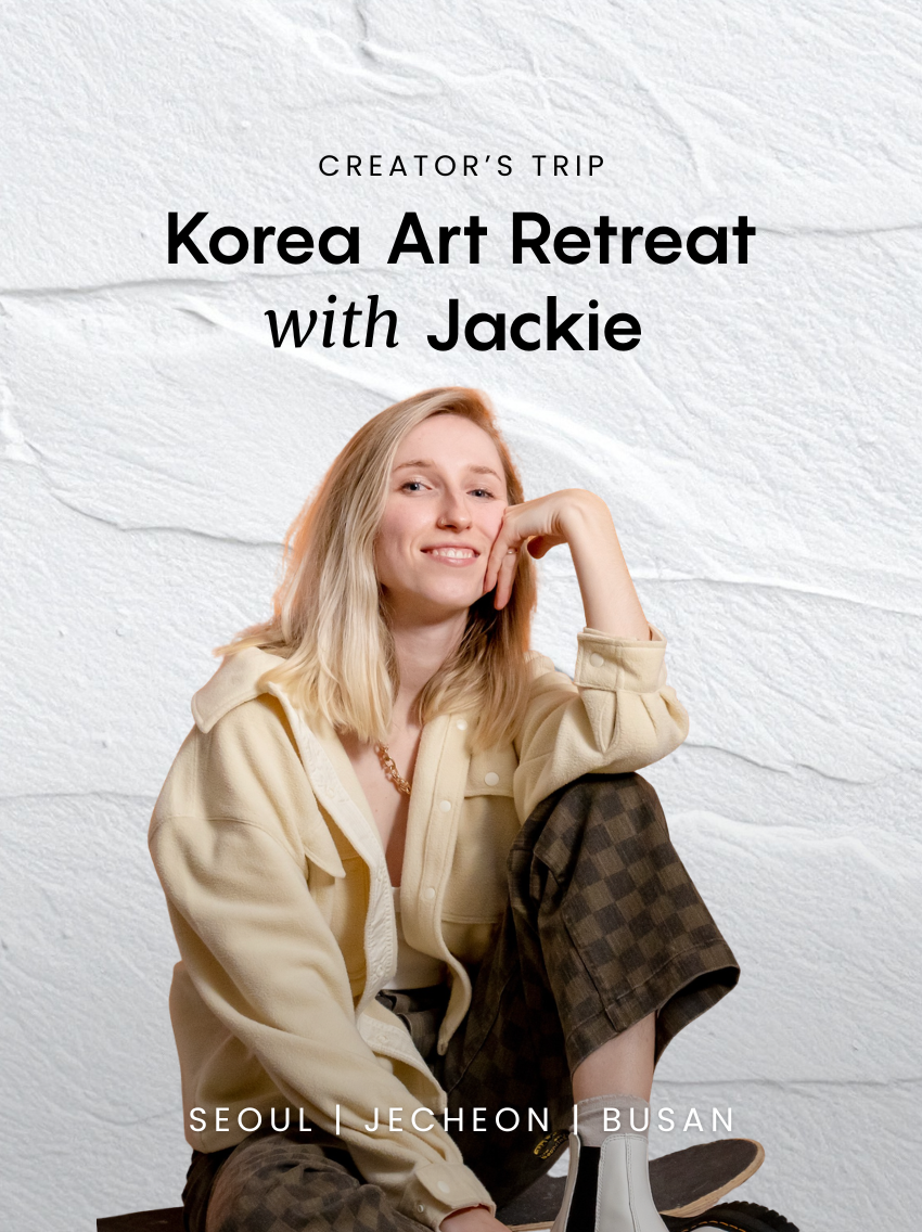 A young woman with blonde hair, smiling and sitting cross-legged on the floor, wearing a beige jacket, brown checkered pants, and white boots, against a white textured background with text about a travel experience to South Korea.