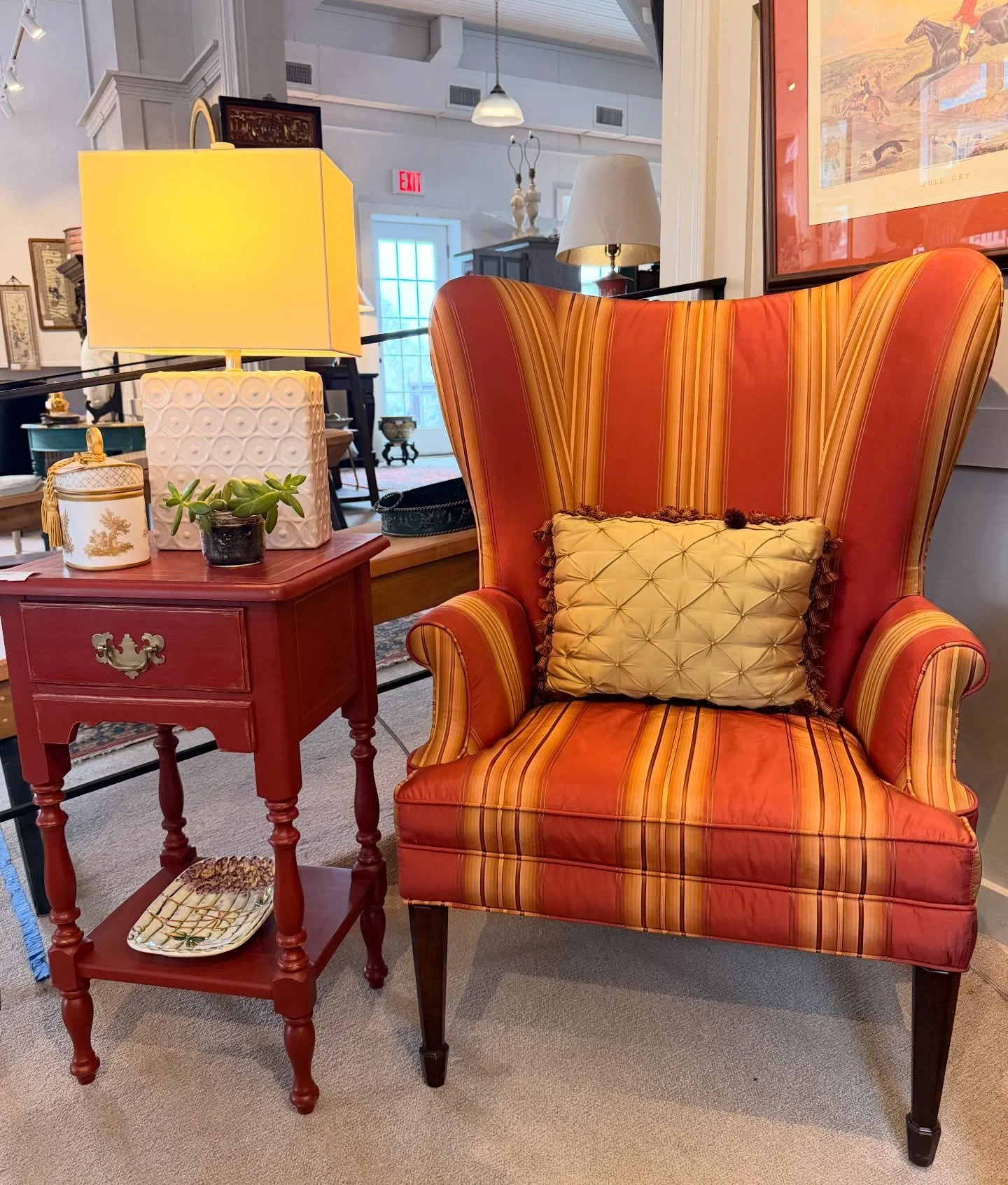 We have a pair of these lovely custom upholstered silk stripe wing chairs; each with a gold pillow. $346.50 each
We also have a pair of these Crate &amp; Barrel Hutton table lamps $86.80 the pair
A vintage hand painted one drawer stand with bottom sh