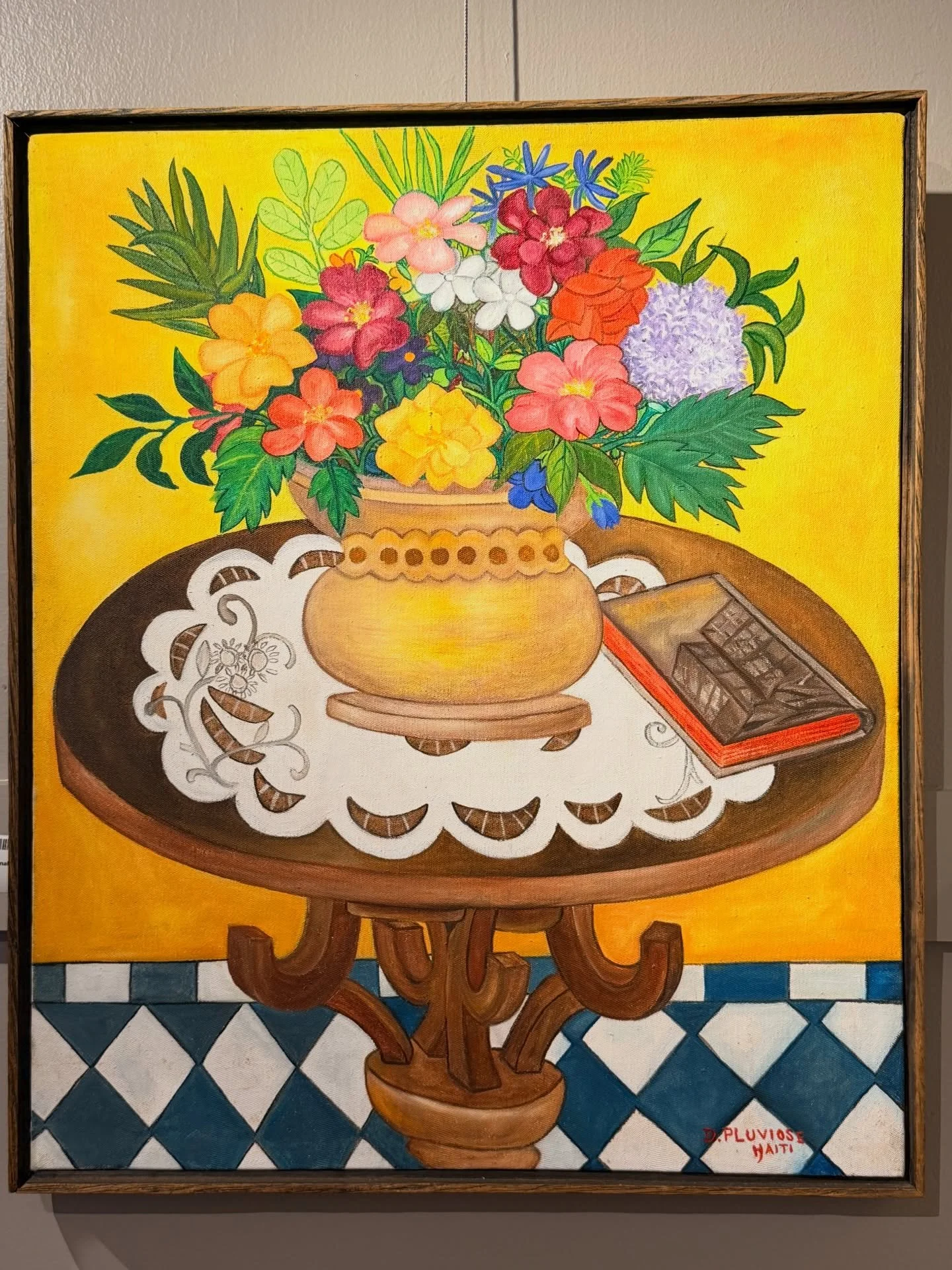 A beautiful and colorful original primitive painting on canvas. Signed by the artist.
Dieudonne Pluviose, born in 1928, is a listed artist from Haiti. Pluviose is a prominent Haitian primitive painter known for his vibrant depictions of everyday life