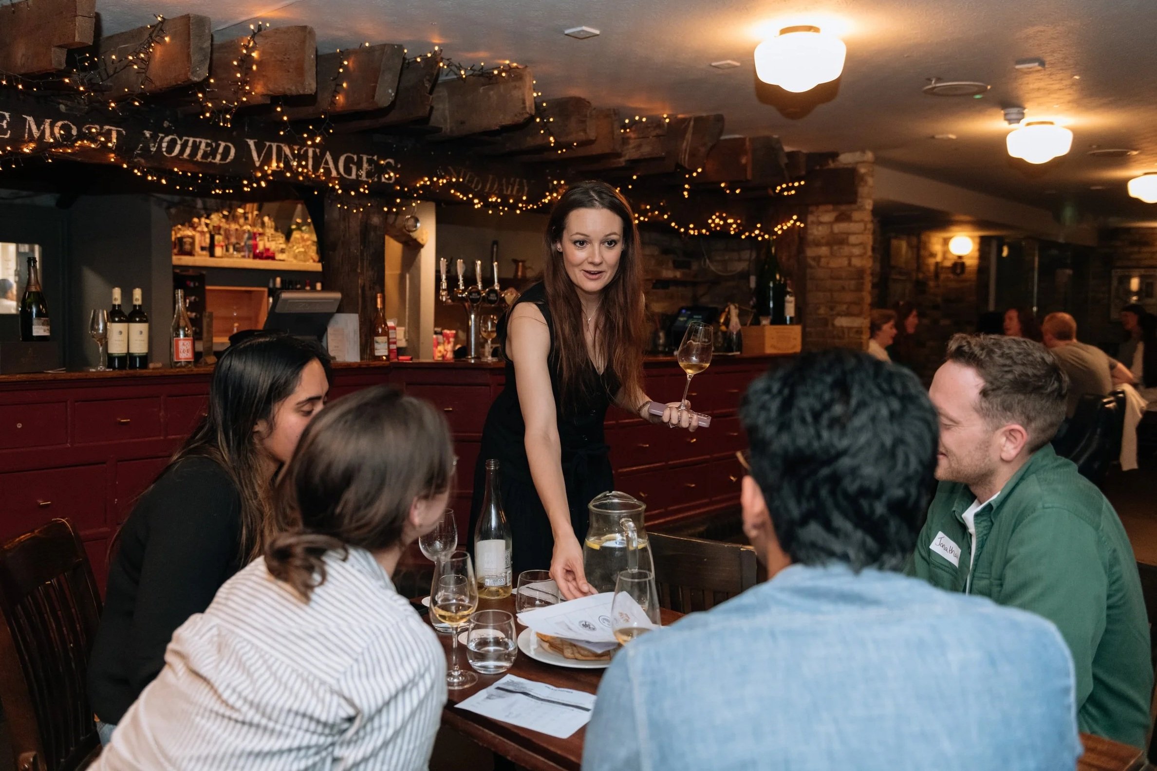 Group of people enjoying a wine tasting