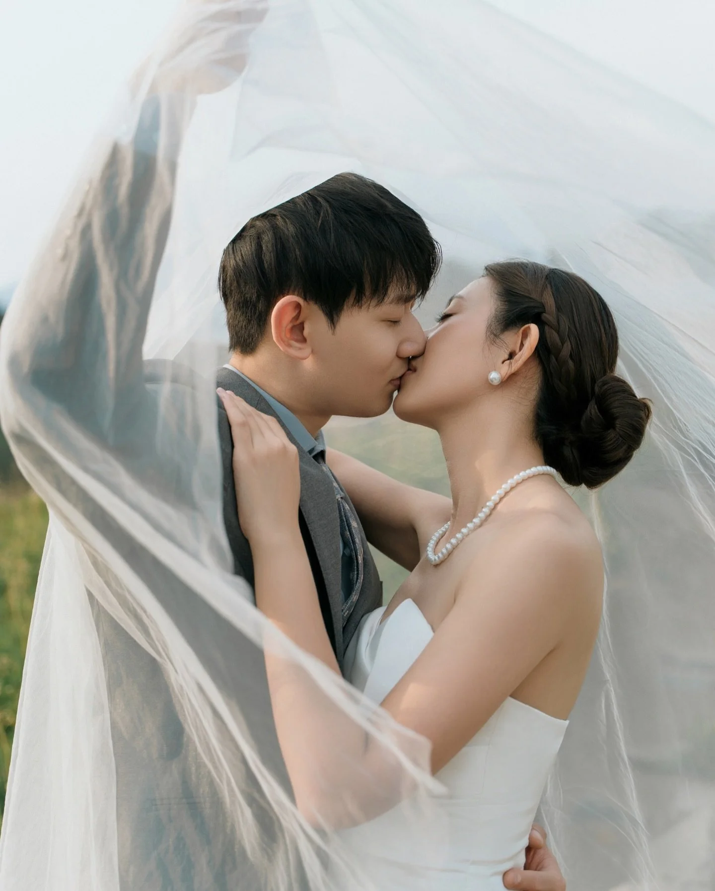 PNW love stories always feel a little like magic ✨ Against the soft greens and stones of Mount Rainier, their laughter melted into the sound of rushing water and autumn wind. No grand audience &mdash; just love, simplicity, and the whisper of nature 