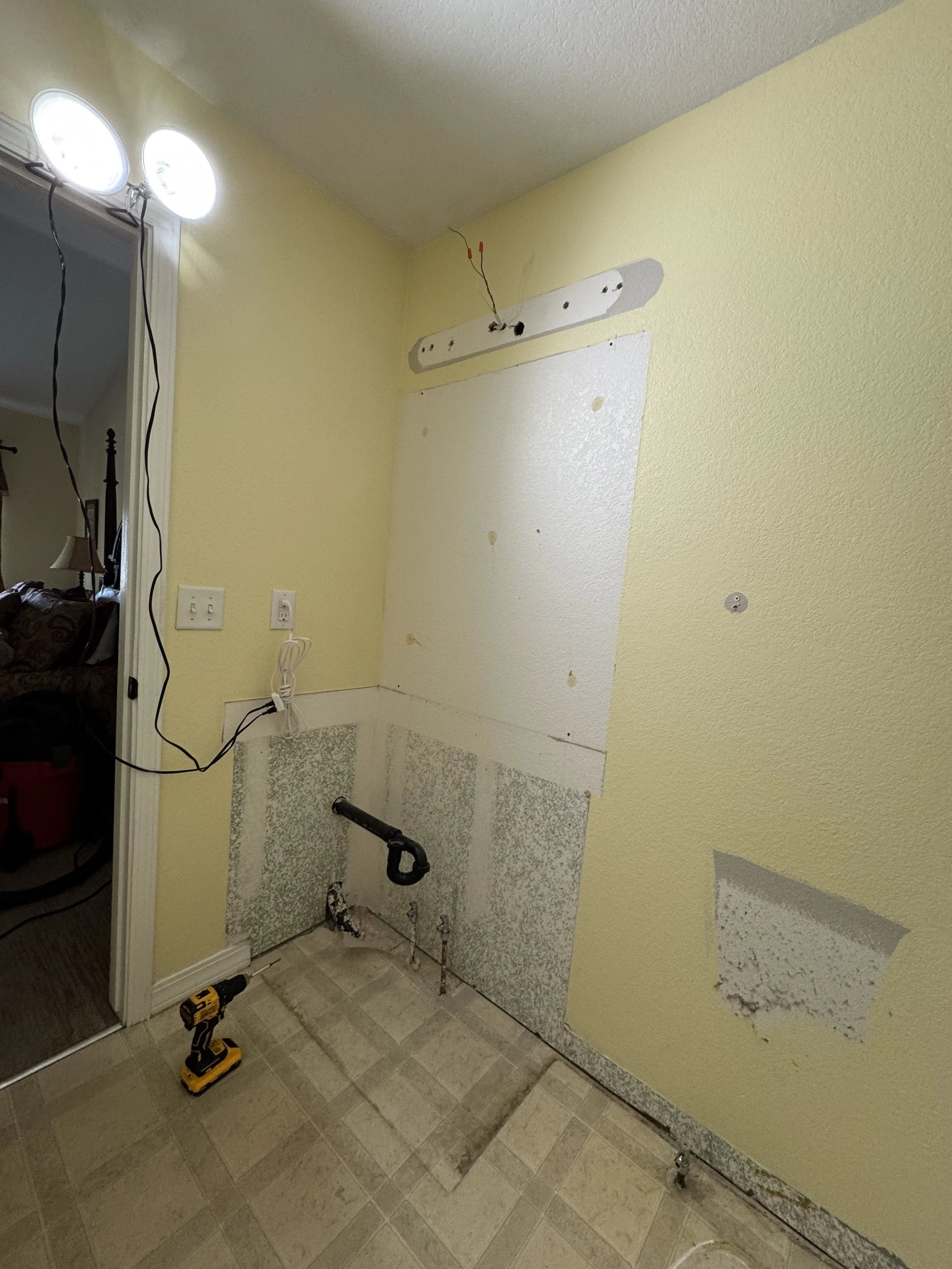 Alternate view—the drain line coming out of the side wall means that I will have to do some surgery on the new vanity to make that work.  No worries, though!  :)