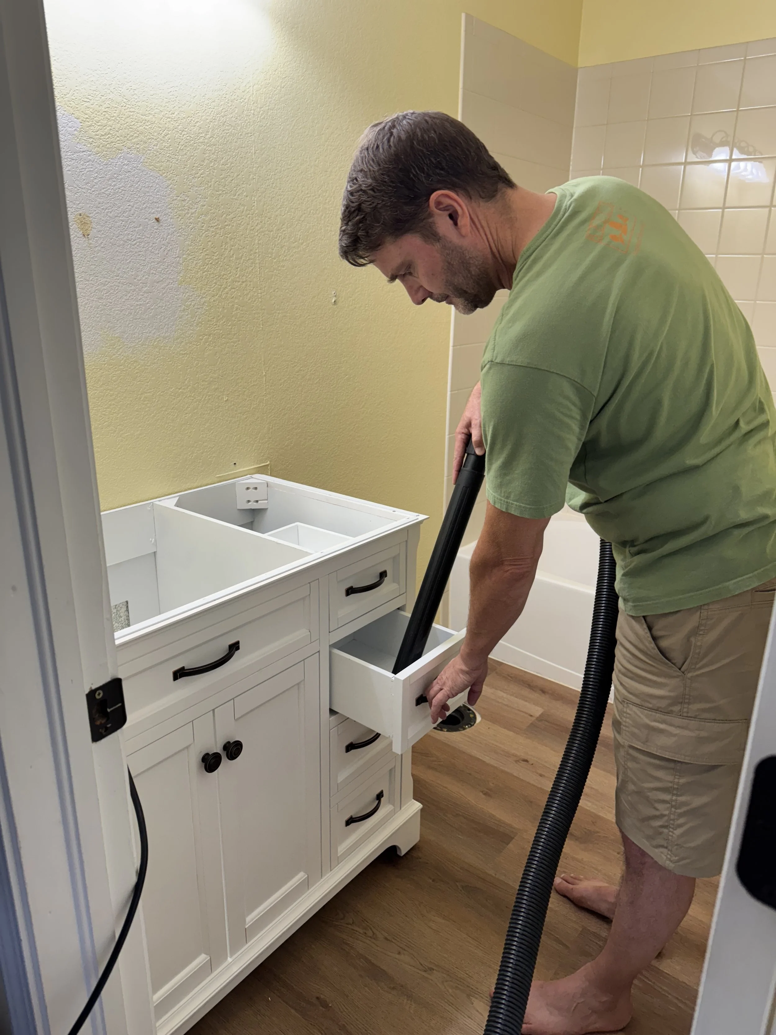 Vanity is set in place.  I always keep things tidy on my projects--cleaning as I go.