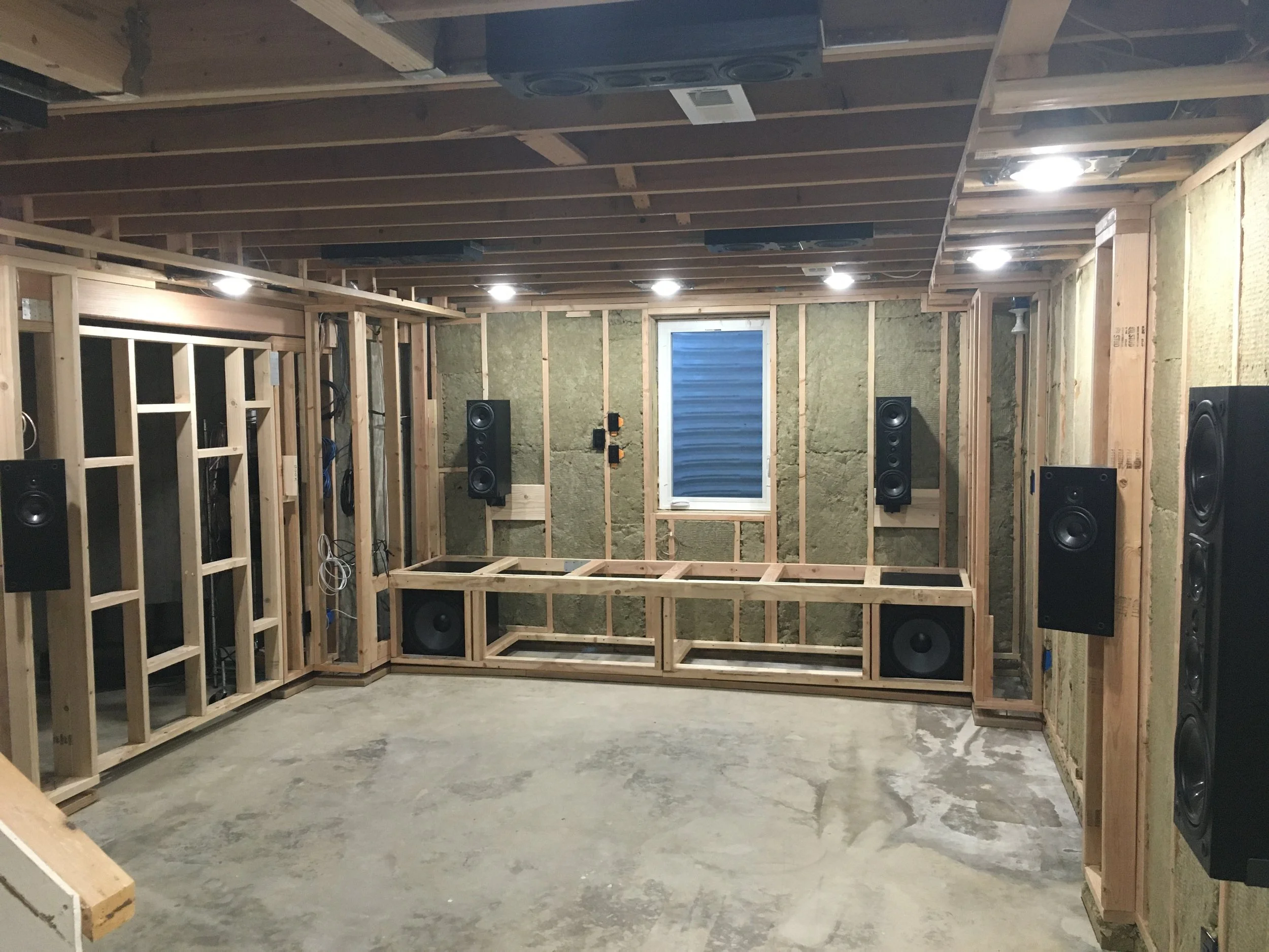 Insulation is in, audio/video wiring is done, speakers and subwoofers are good-to-go--sounds amazing!  Like… genuinely INCREDIBLE.