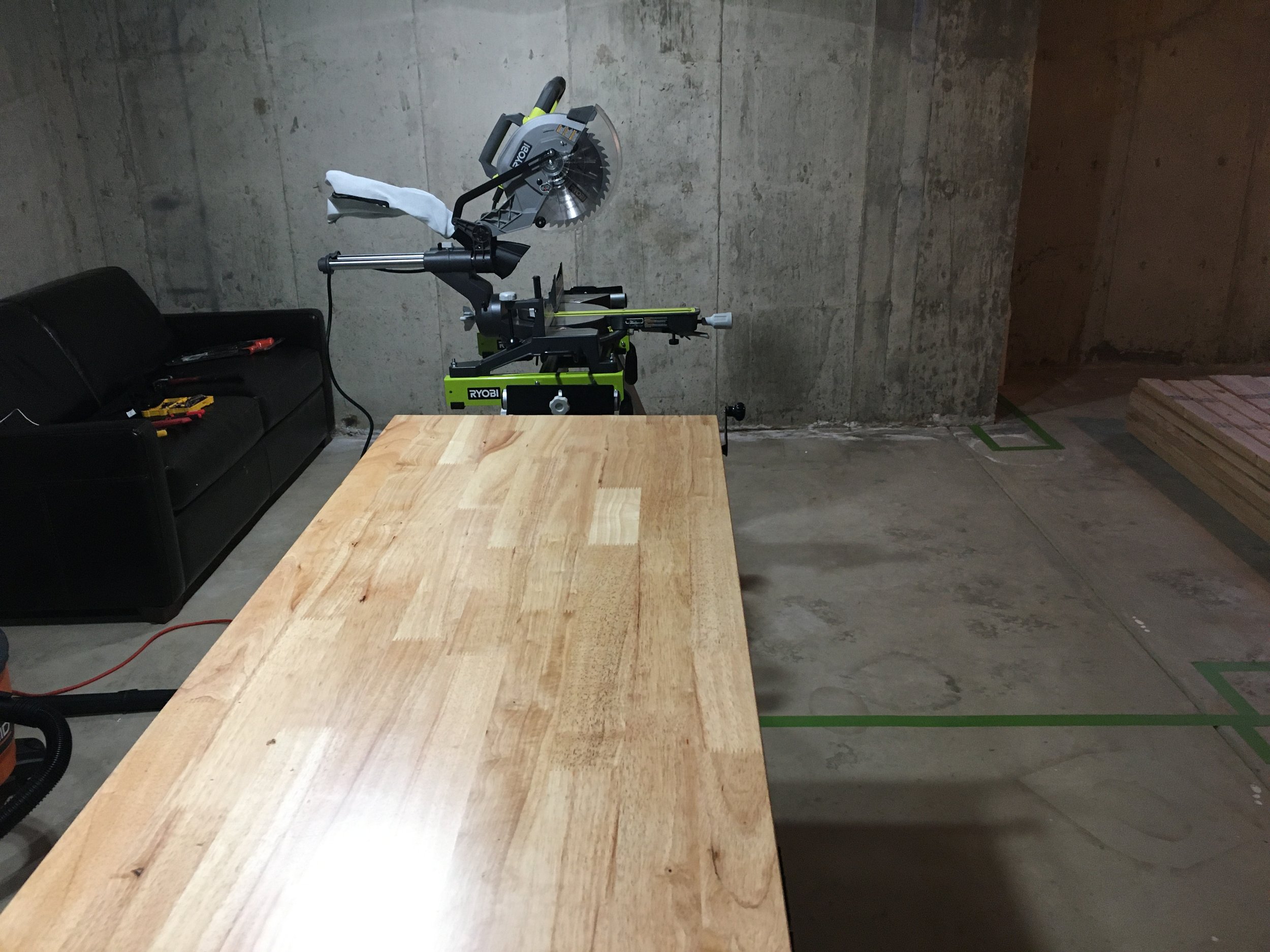 Workspace is set up, wall lines (where the future walls are going to be) are taped to the floor.