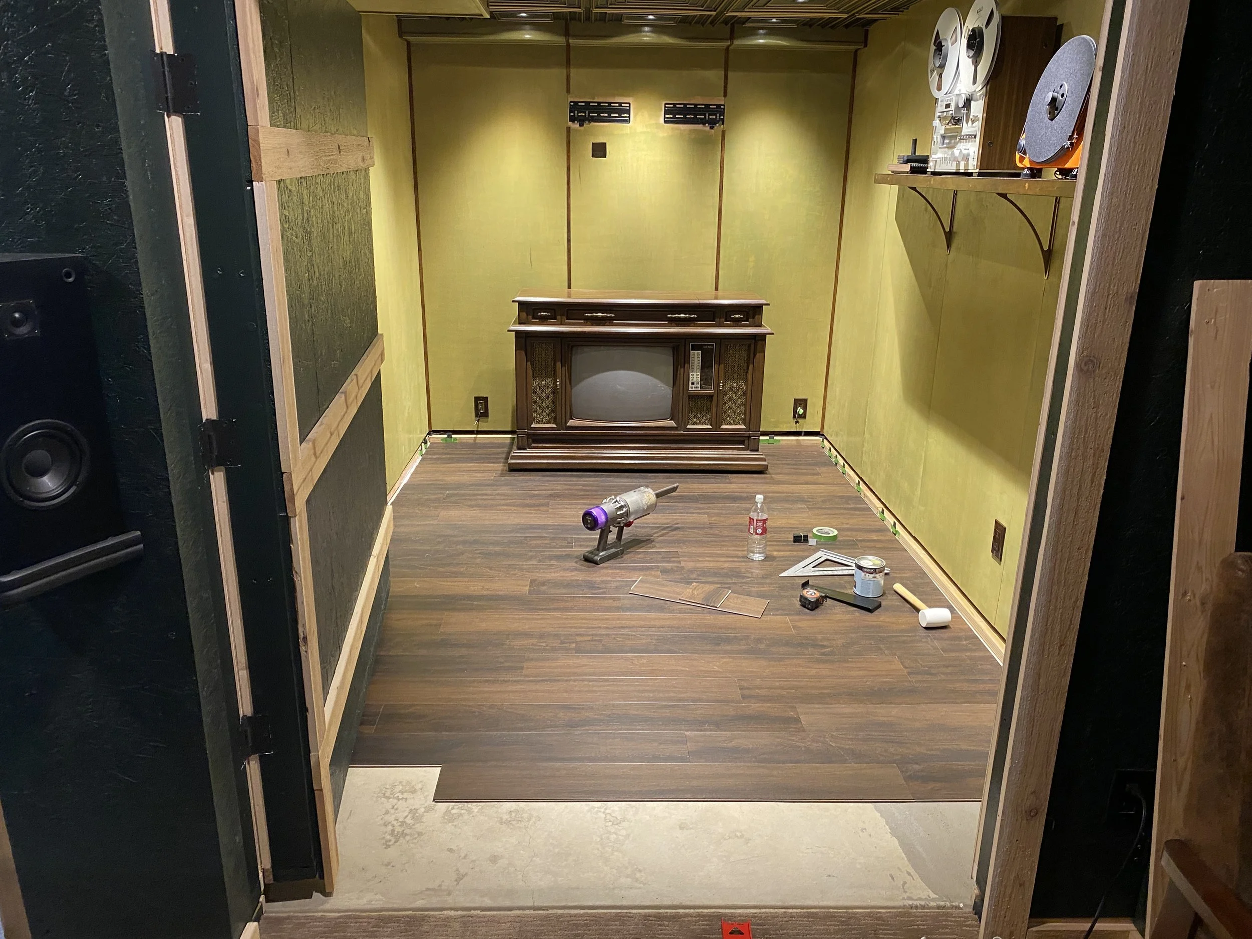 Installing the floor--easy to work with vinyl plank, took me about three hours is all.