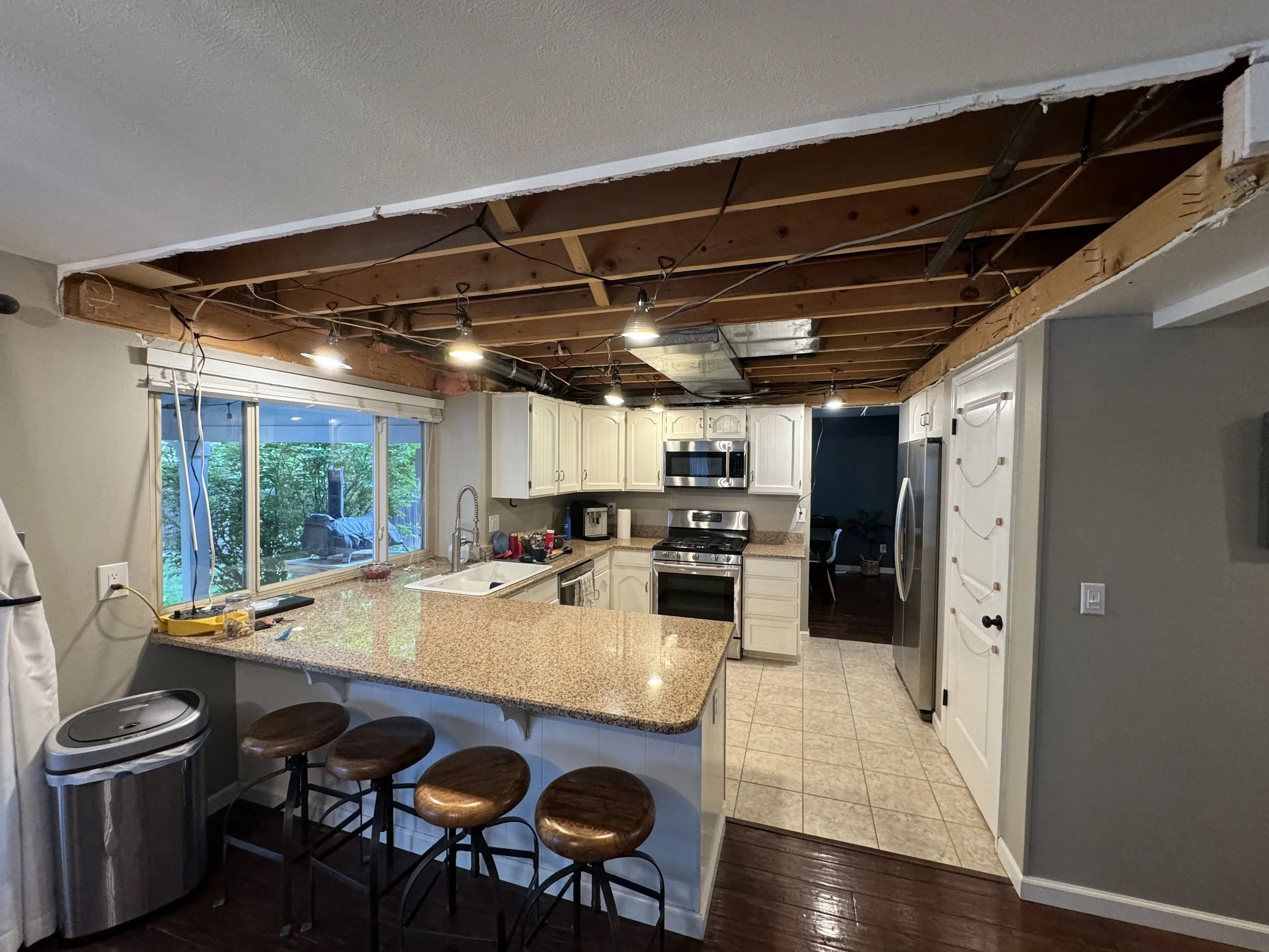 And there it is. Lots of cleaning up to do, to get everything above the bottom of the joists.